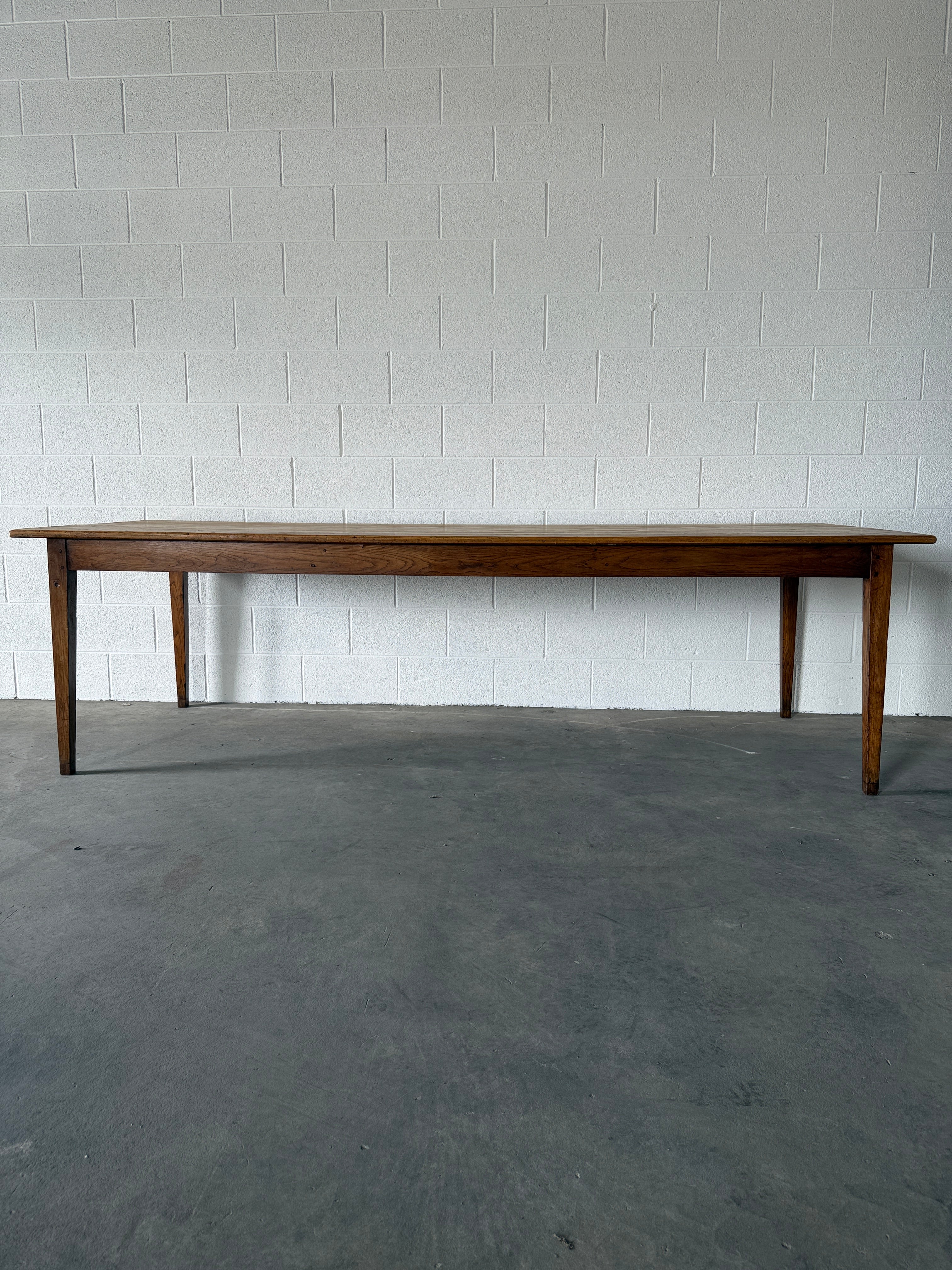 Incredible antique pine and fruitwood dining table with tapered legs