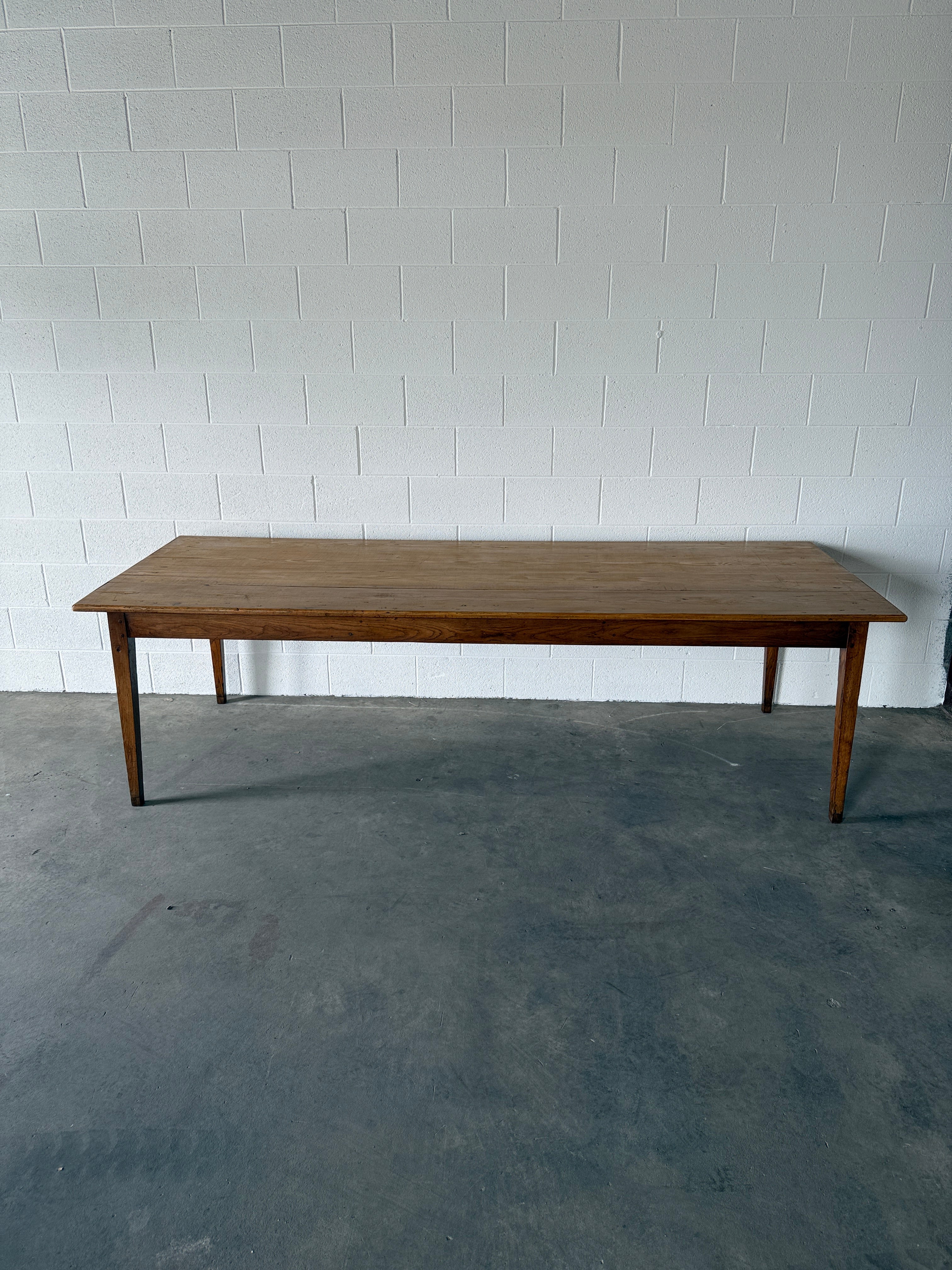 Incredible antique pine and fruitwood dining table with tapered legs