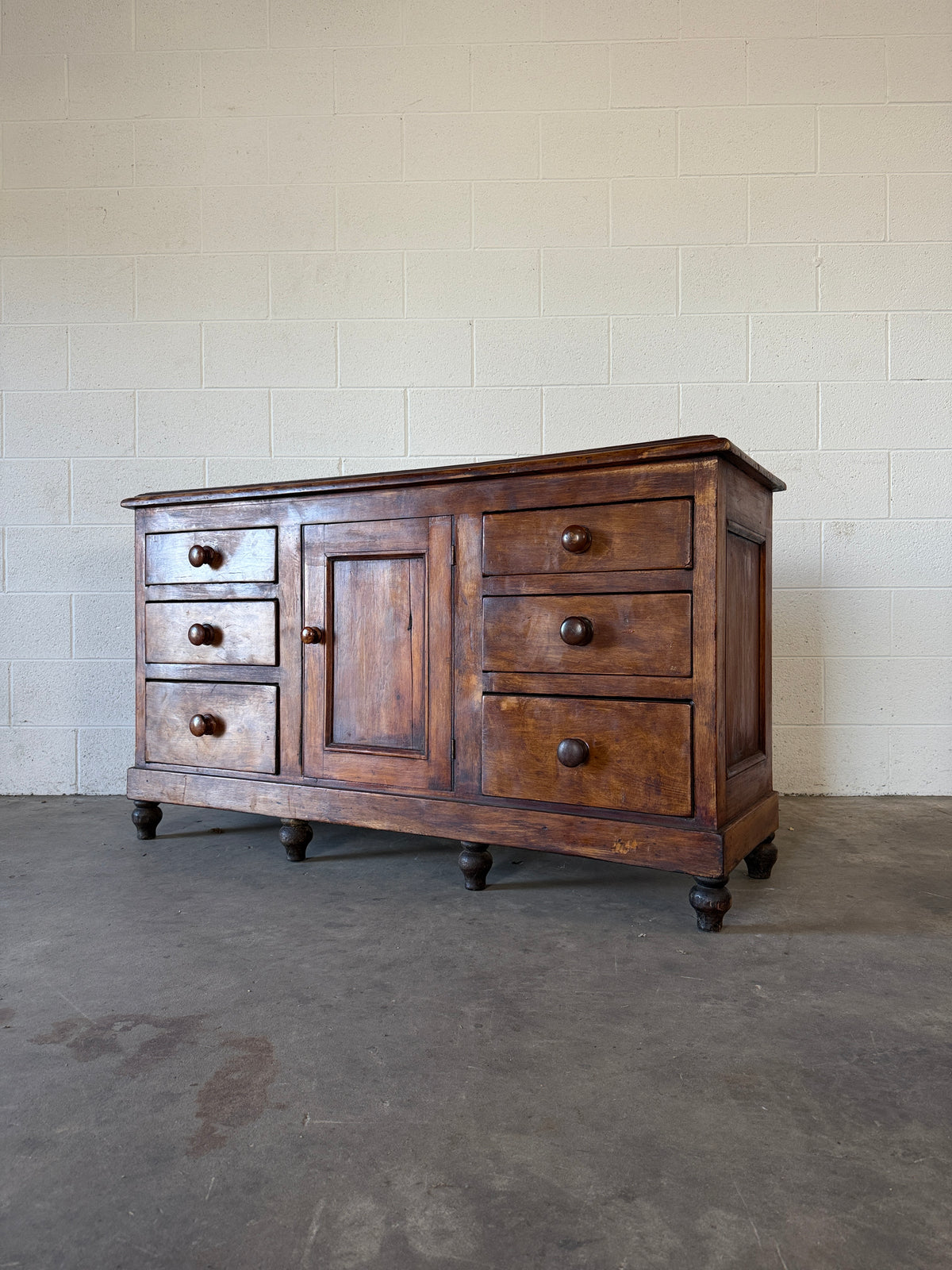 Antique sideboard in a dark wax finish
