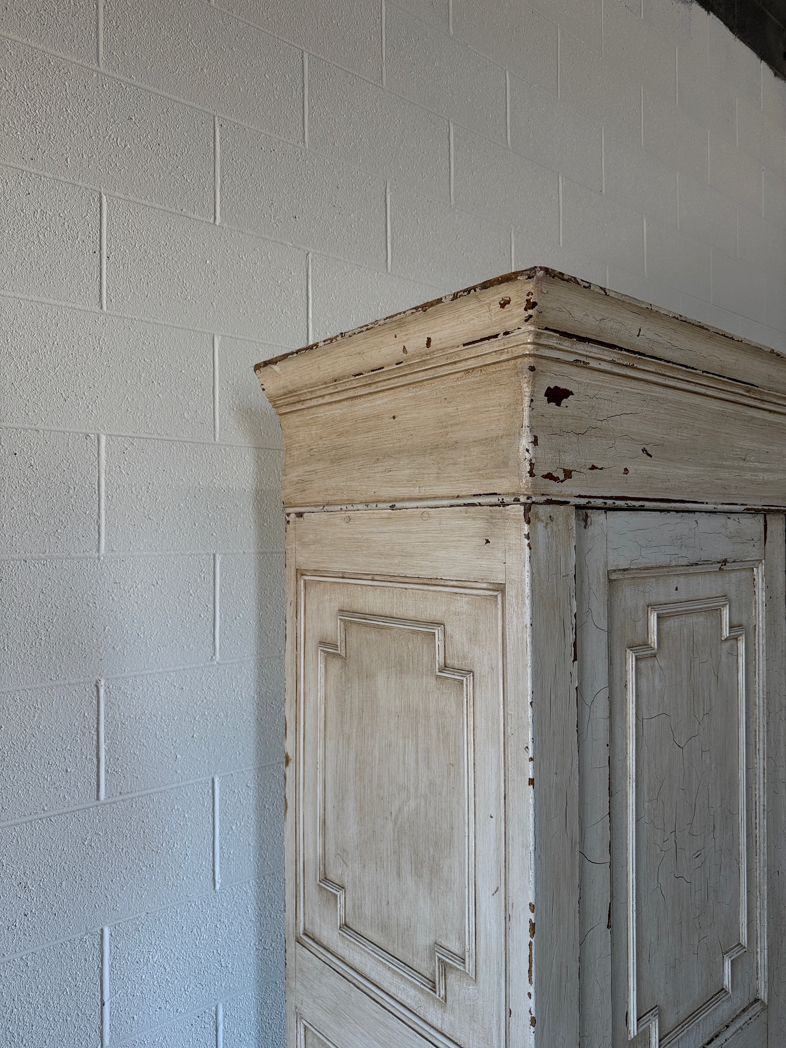 White chippy French wardrobe