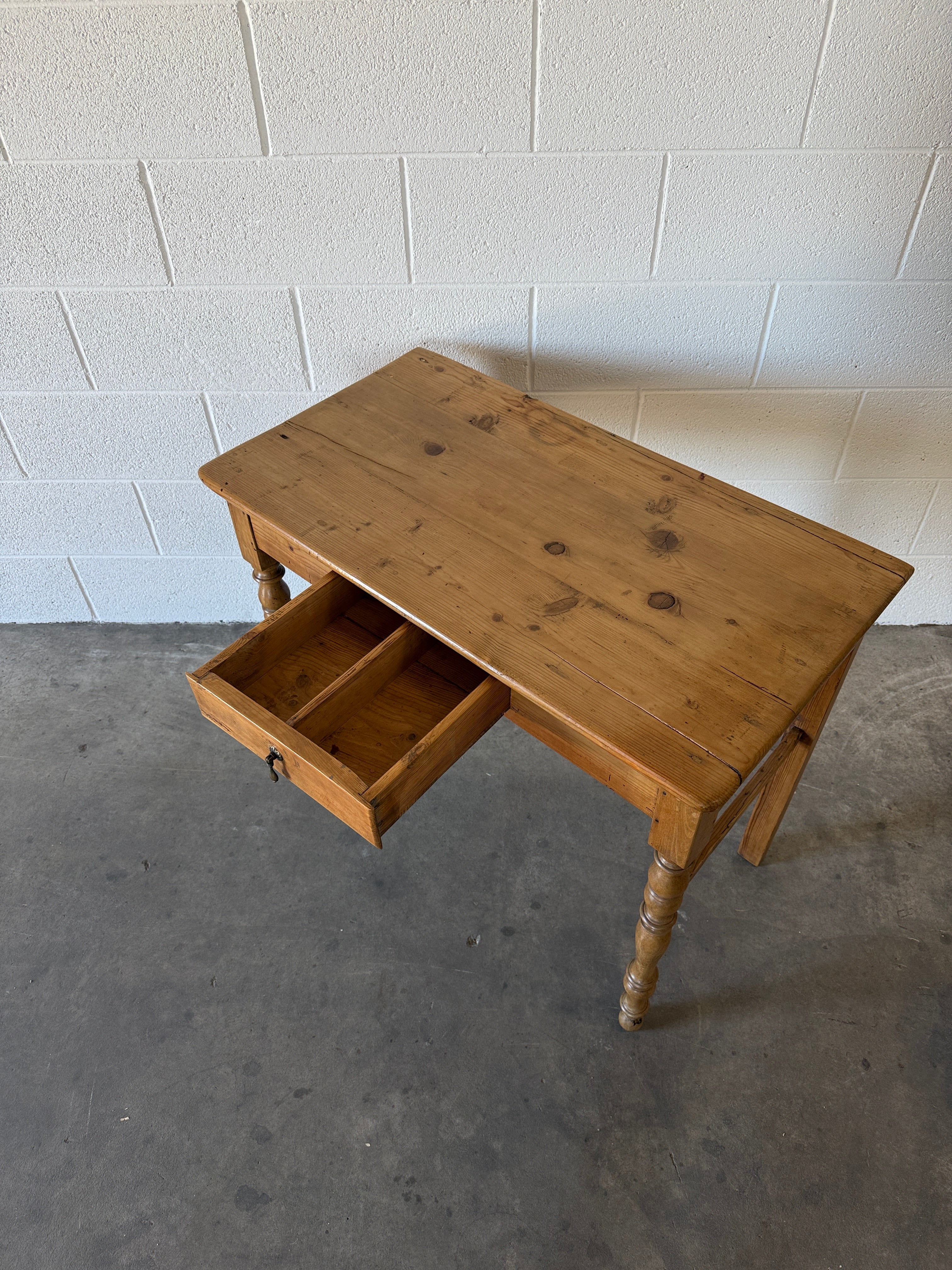 Antique pine side table with a teardrop handle