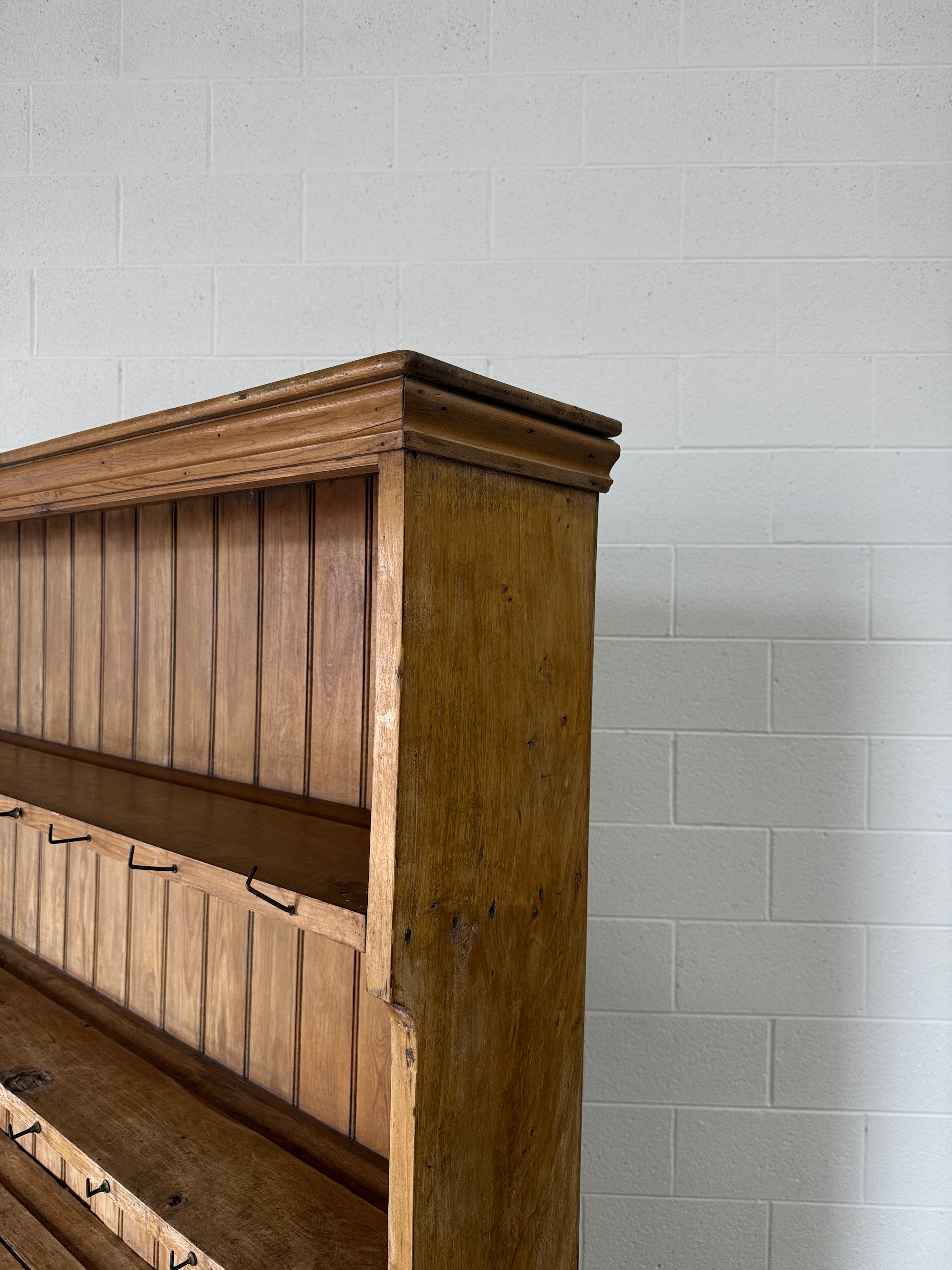 Simple antique English pine kitchen dresser with potboard base