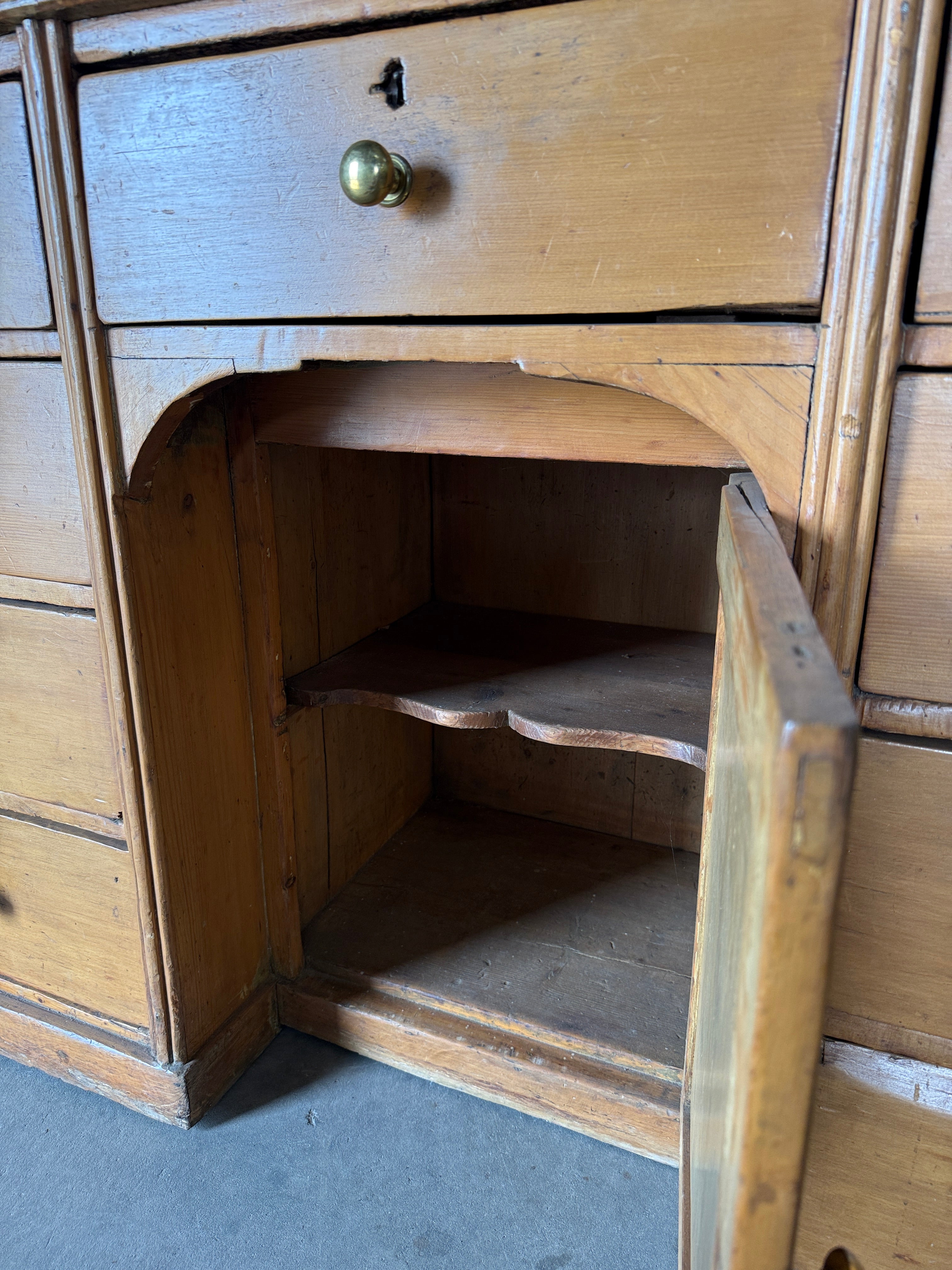 Scalloped English pine housekeeper’s cupboard