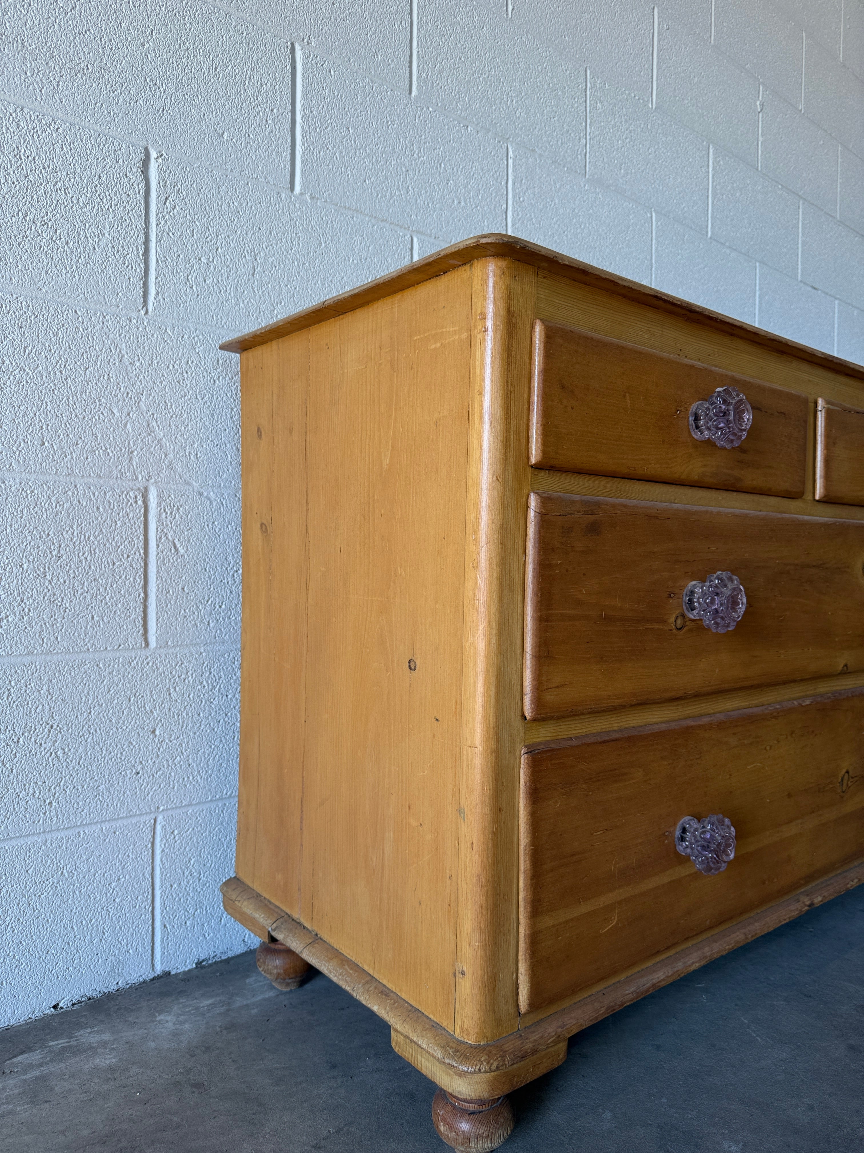 Victorian English pine chest of drawers with glass knobs