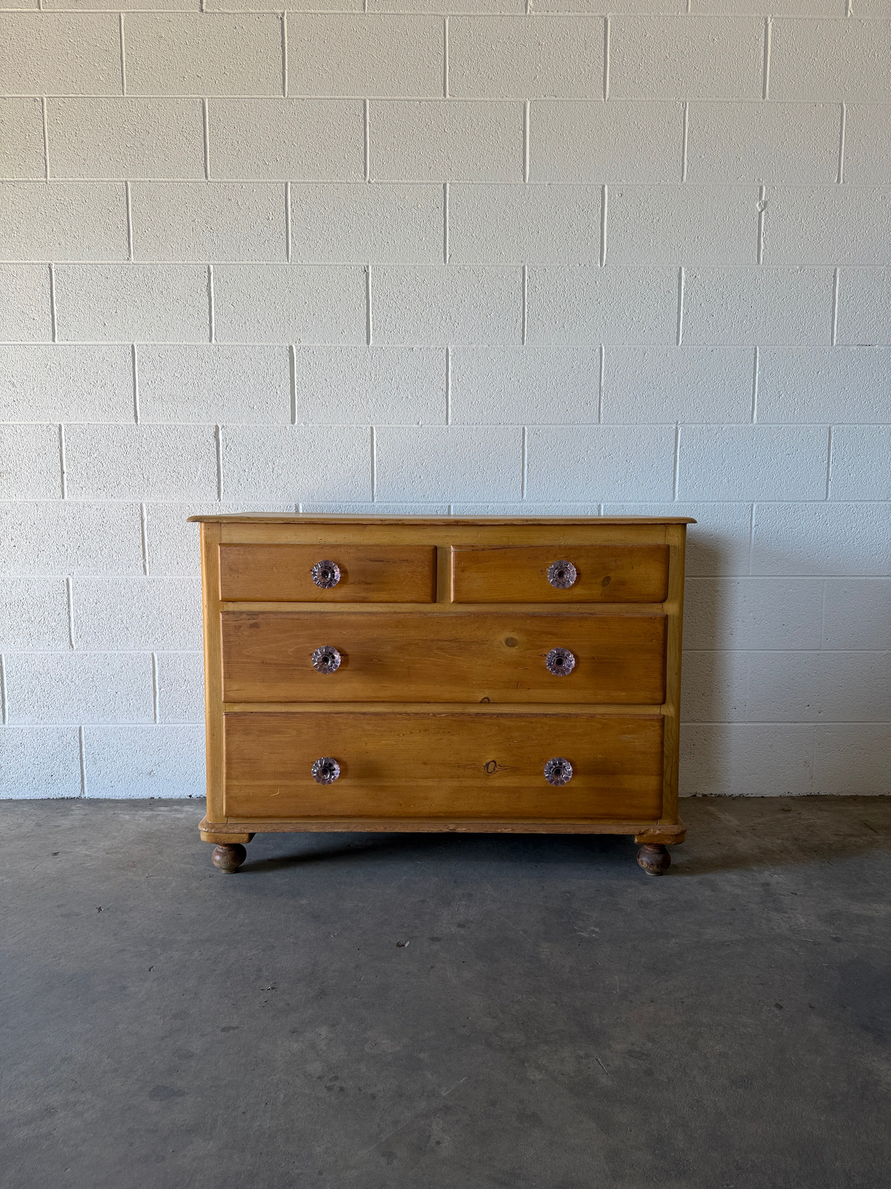 Victorian English pine chest of drawers with glass knobs
