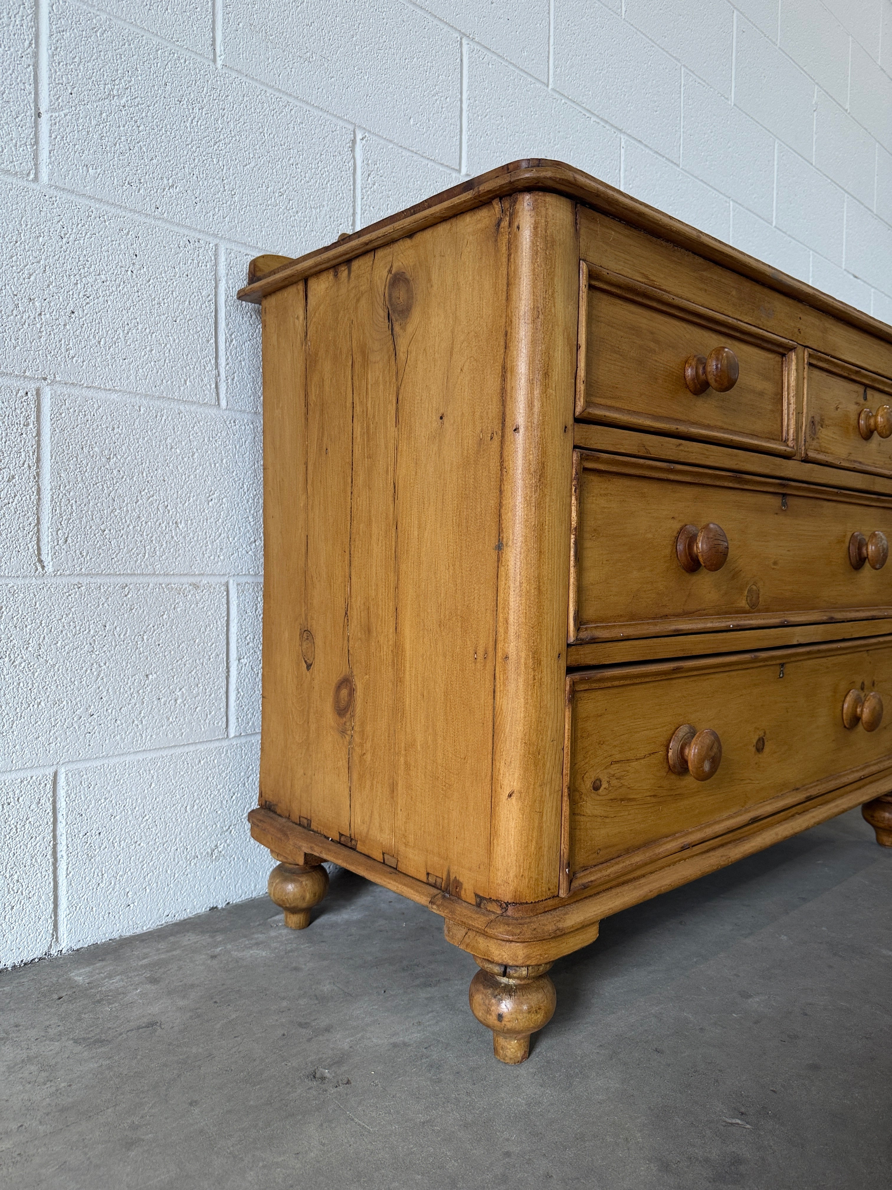 Small antique pine chest of drawers with gallery back