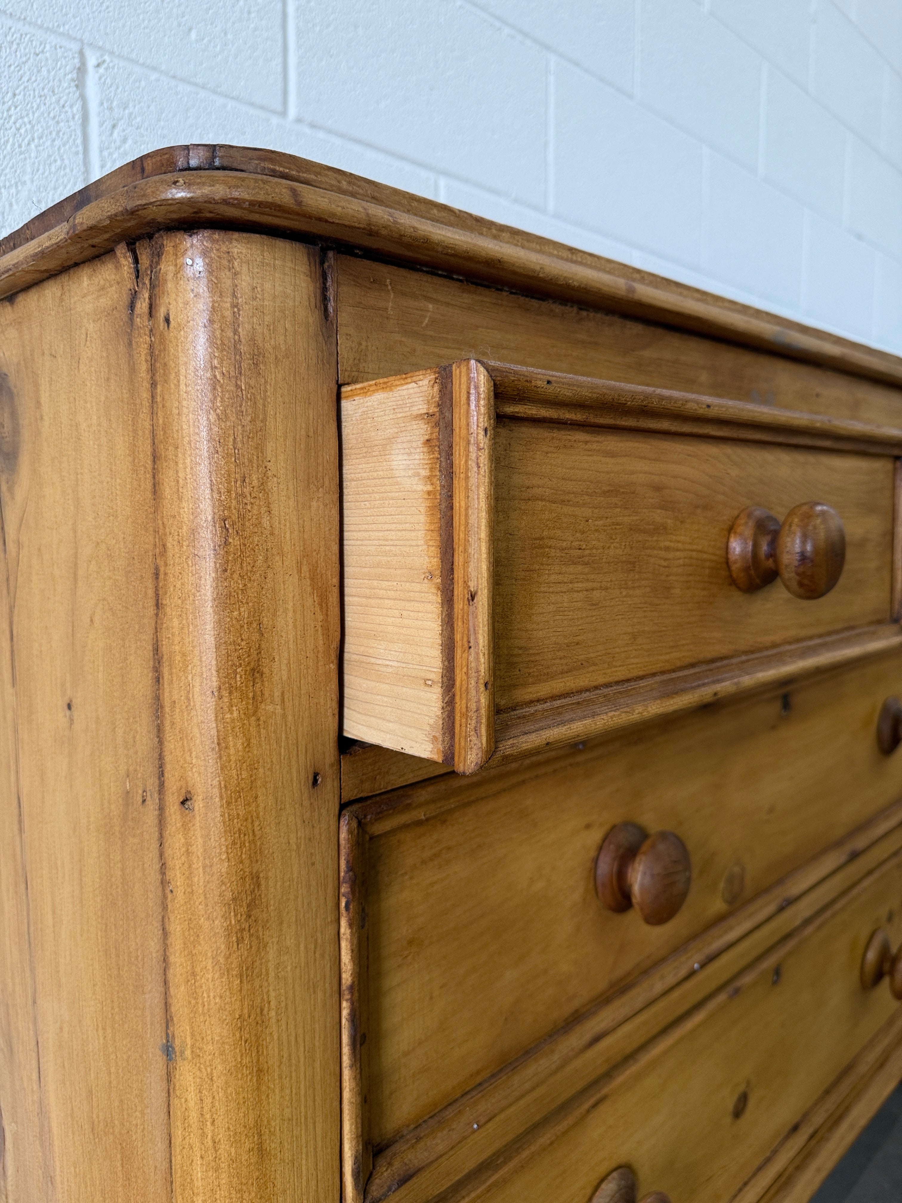 Small antique pine chest of drawers with gallery back