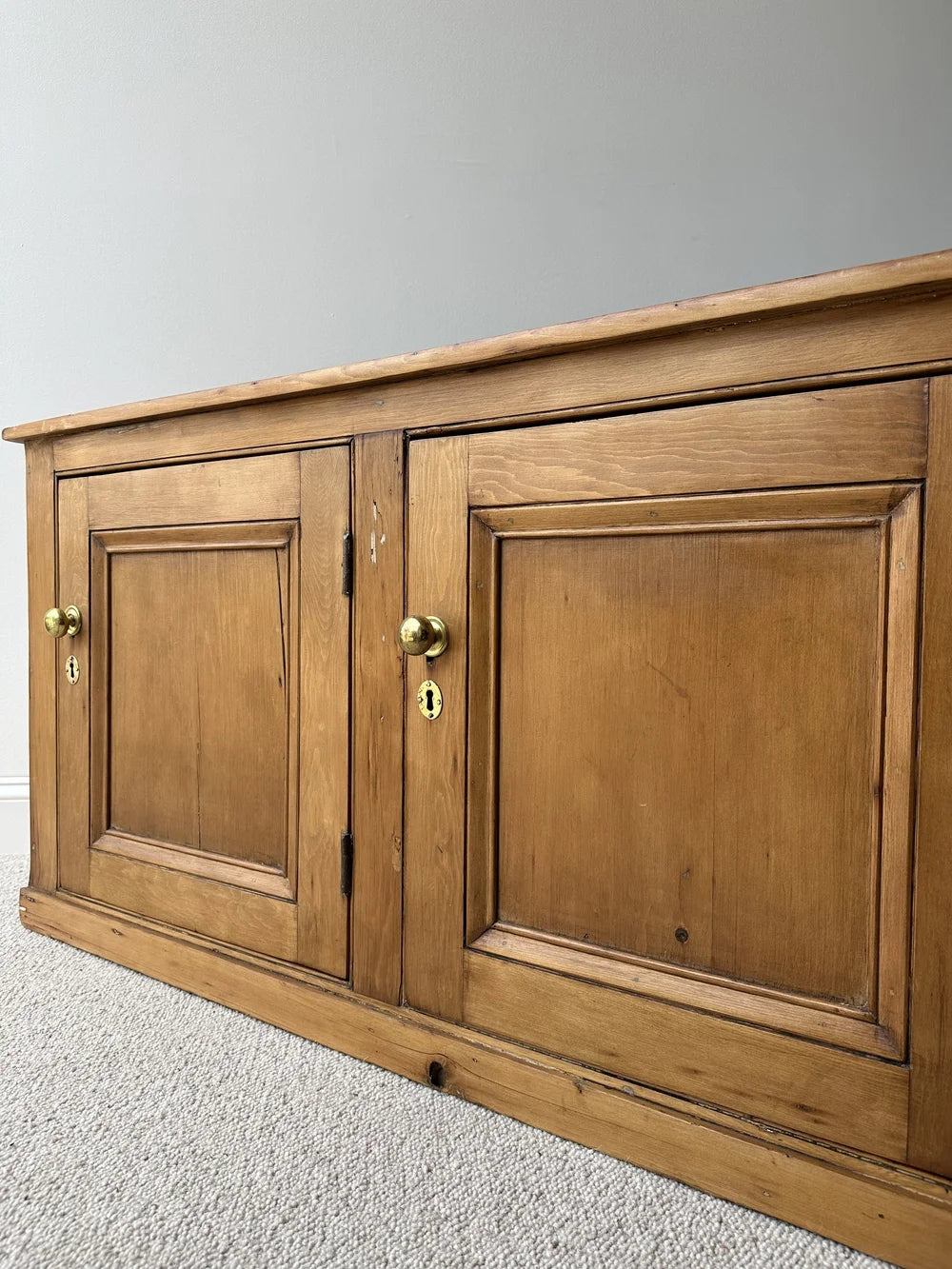 Wide English pine antique three door cupboard