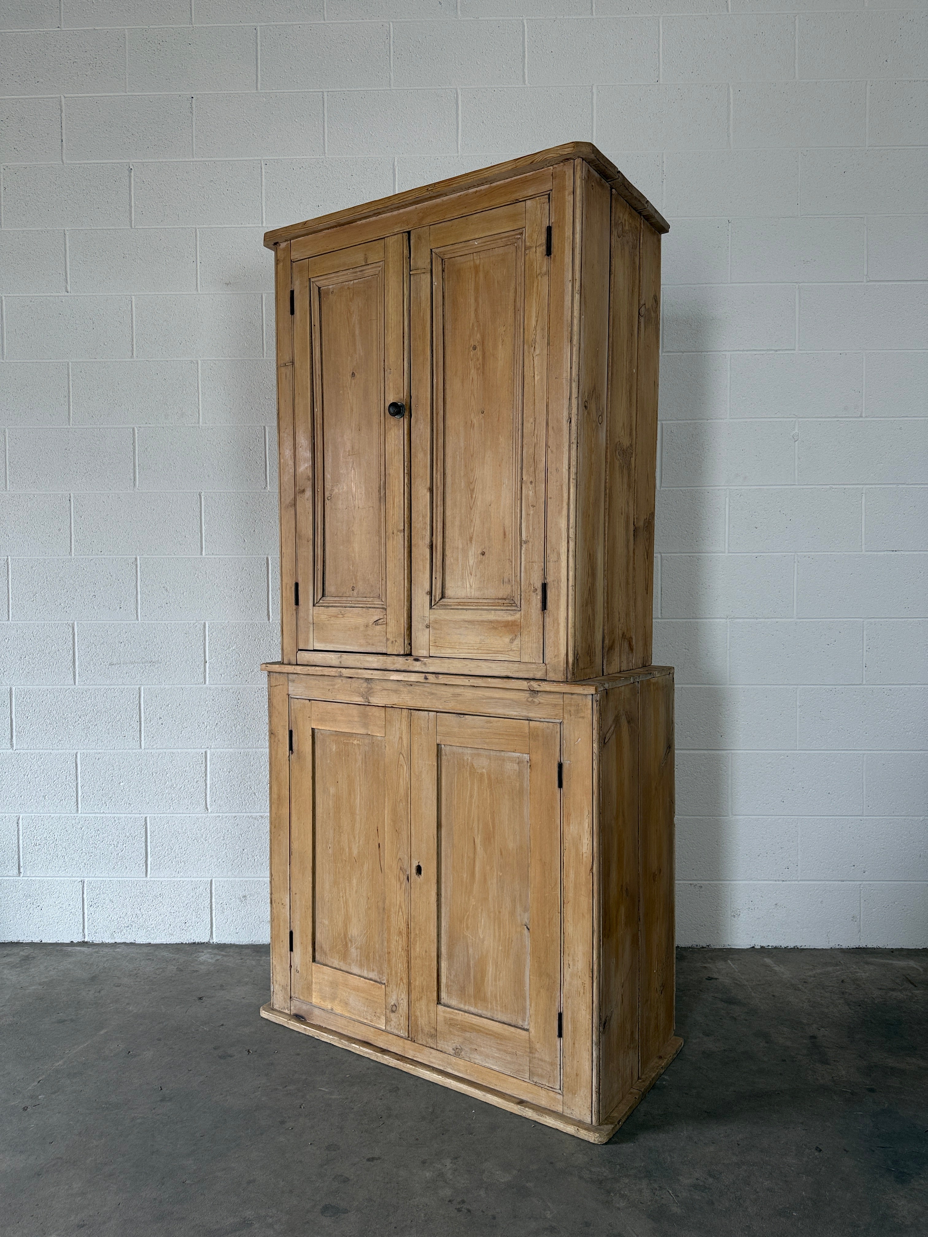 19th‑Century English two-part pine housekeeper’s cupboard