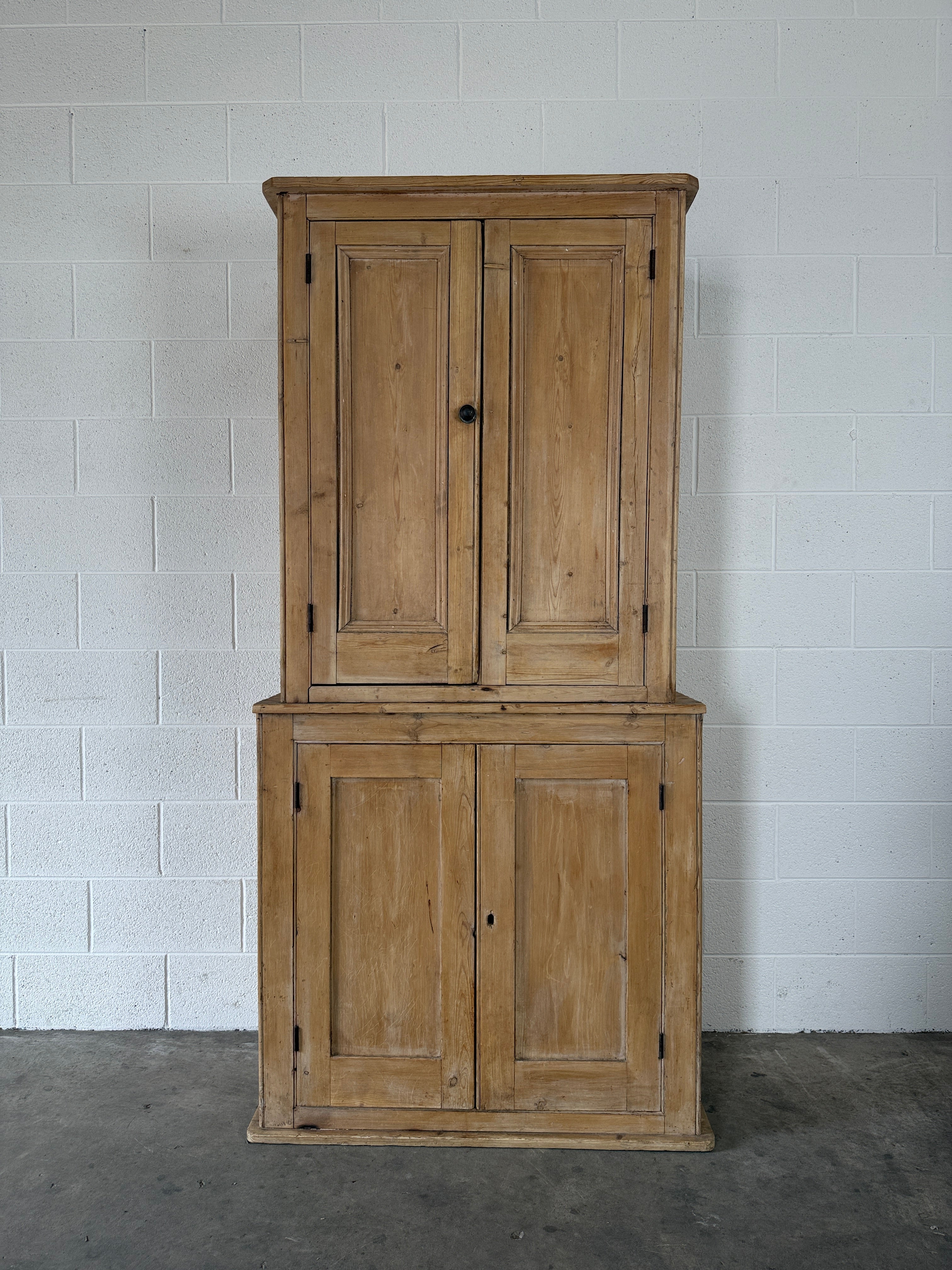 19th‑Century English two-part pine housekeeper’s cupboard