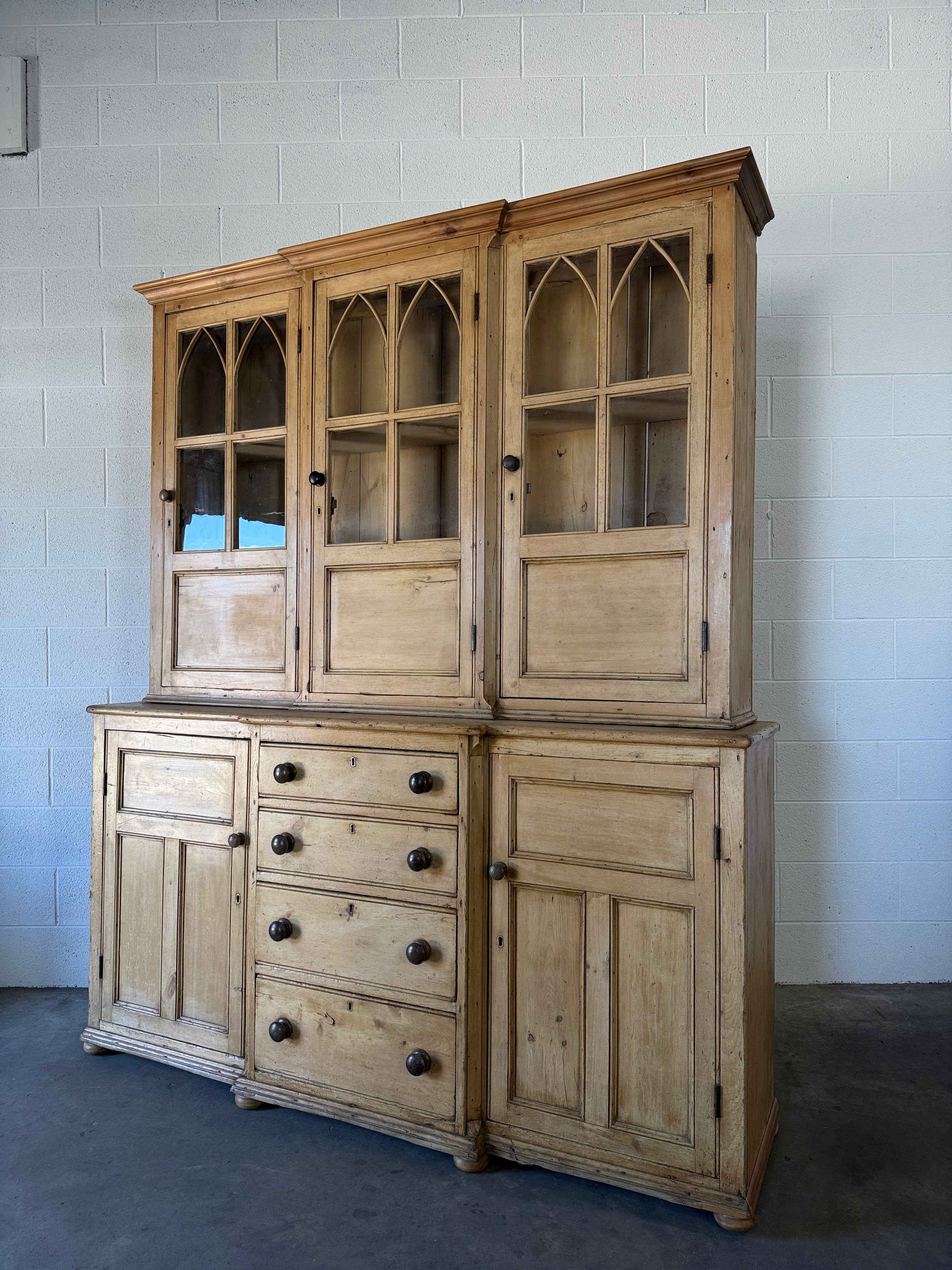 19th‑century English pine cupboard or display case with glass doors
