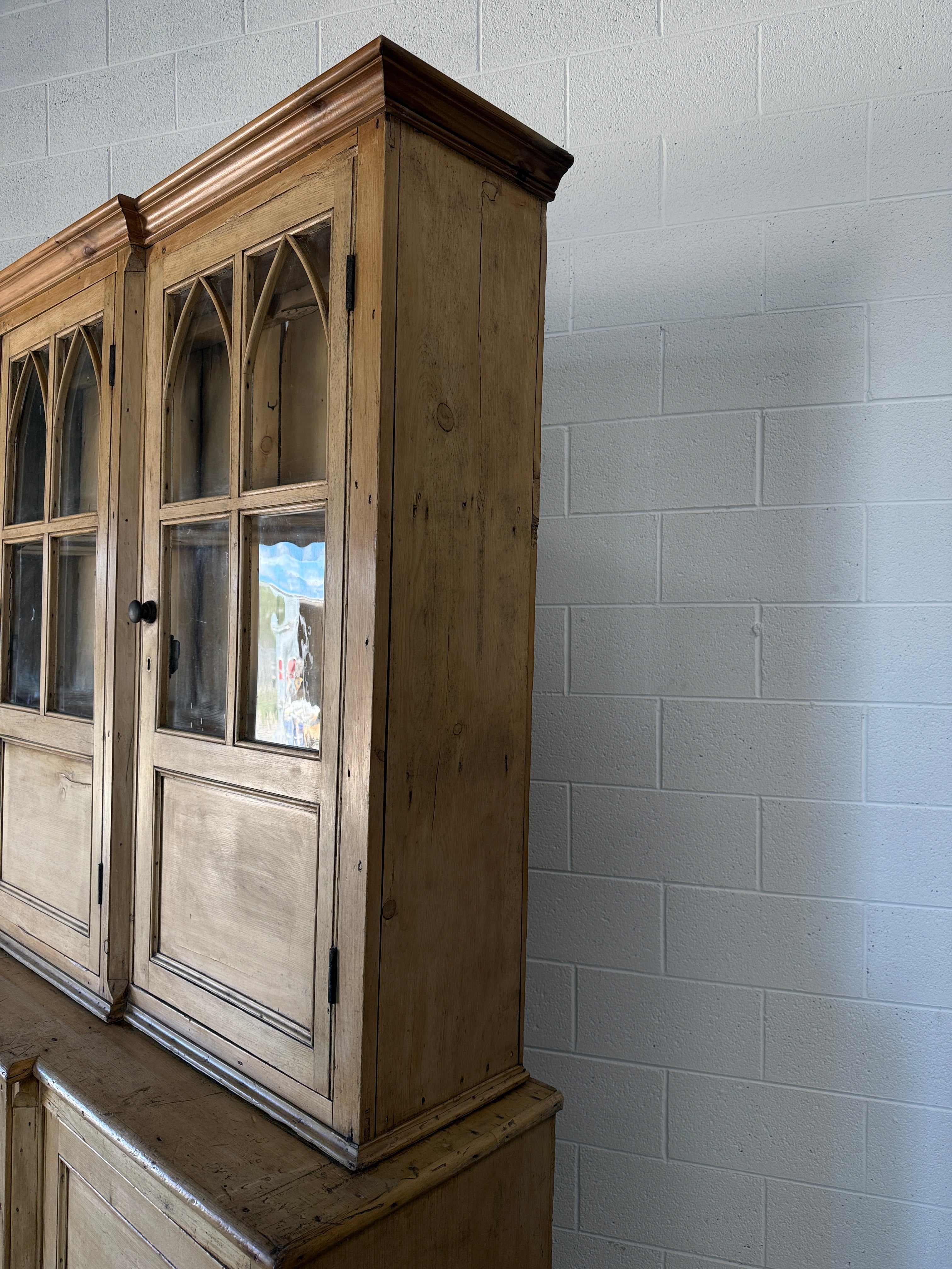 19th‑century English pine cupboard or display case with glass doors