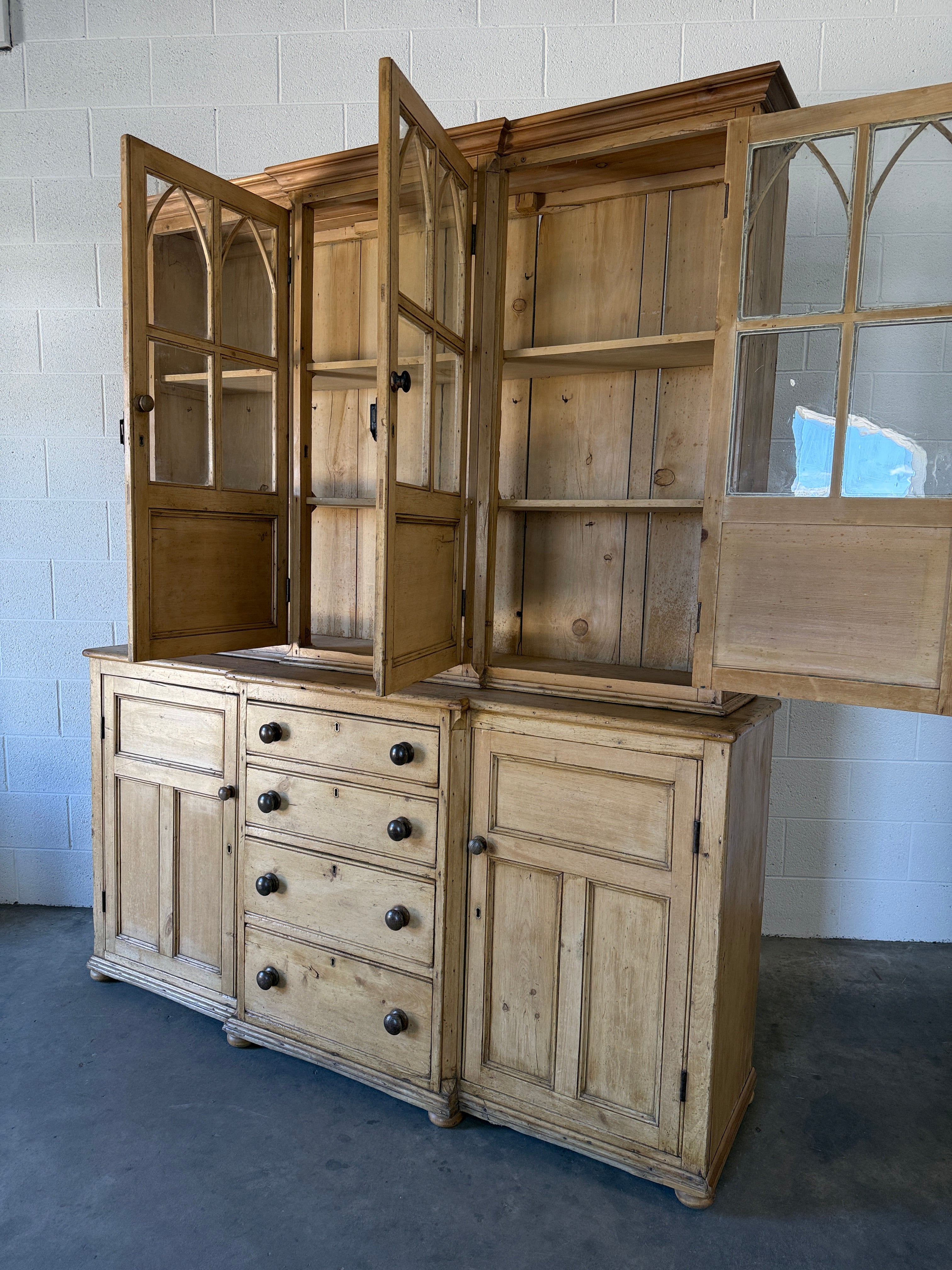 19th‑century English pine cupboard or display case with glass doors