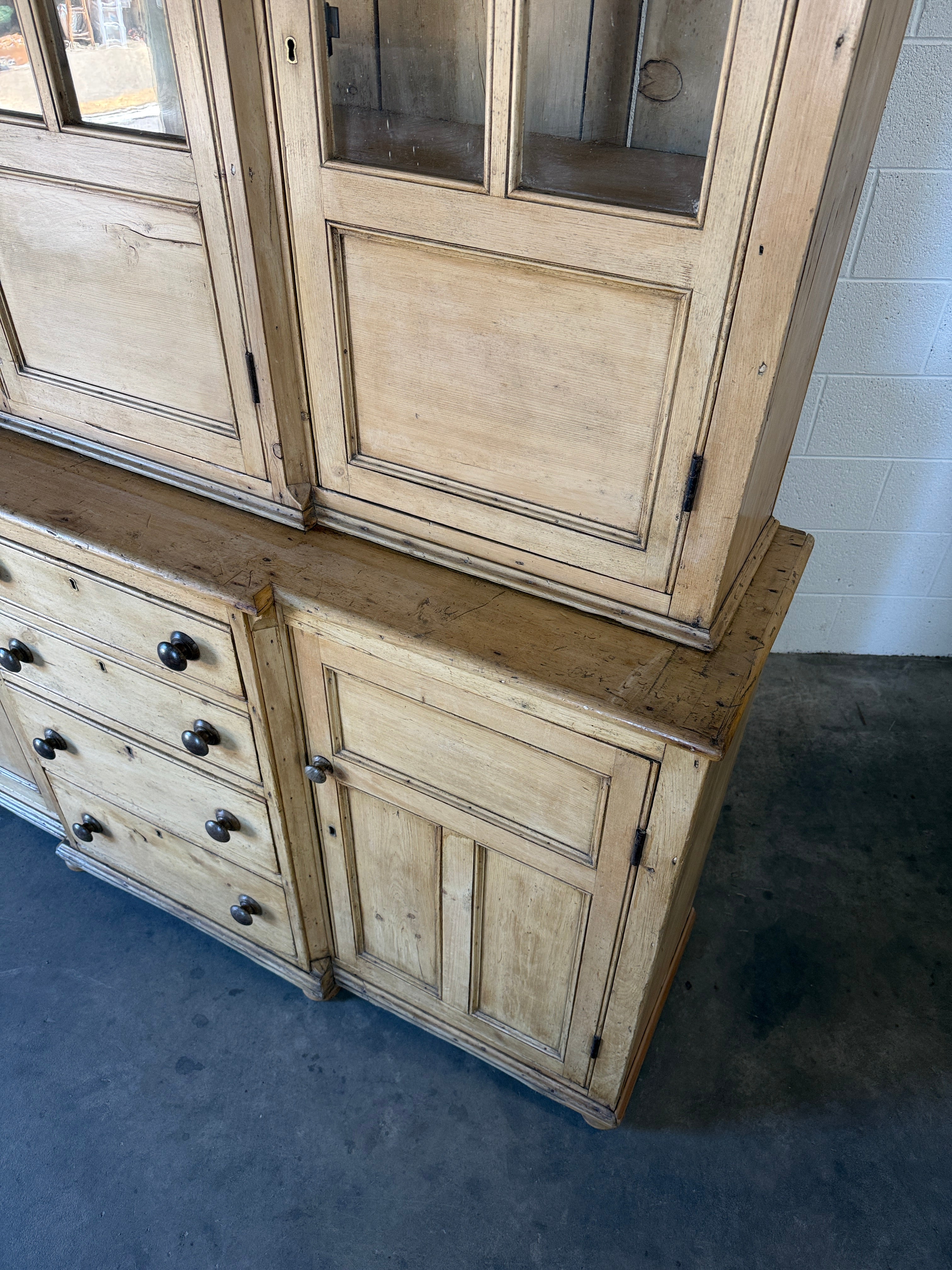 19th‑century English pine cupboard or display case with glass doors
