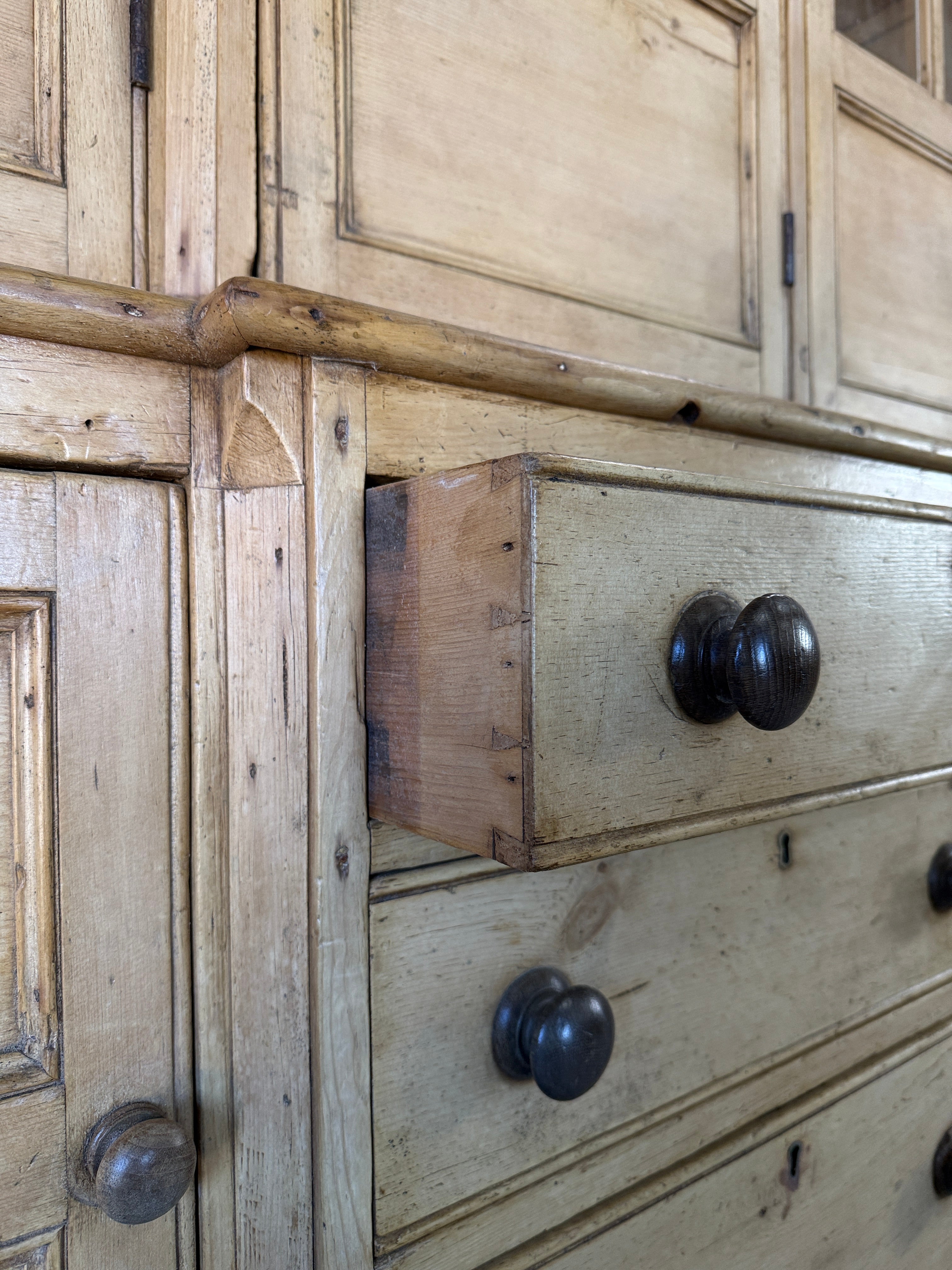 19th‑century English pine cupboard or display case with glass doors