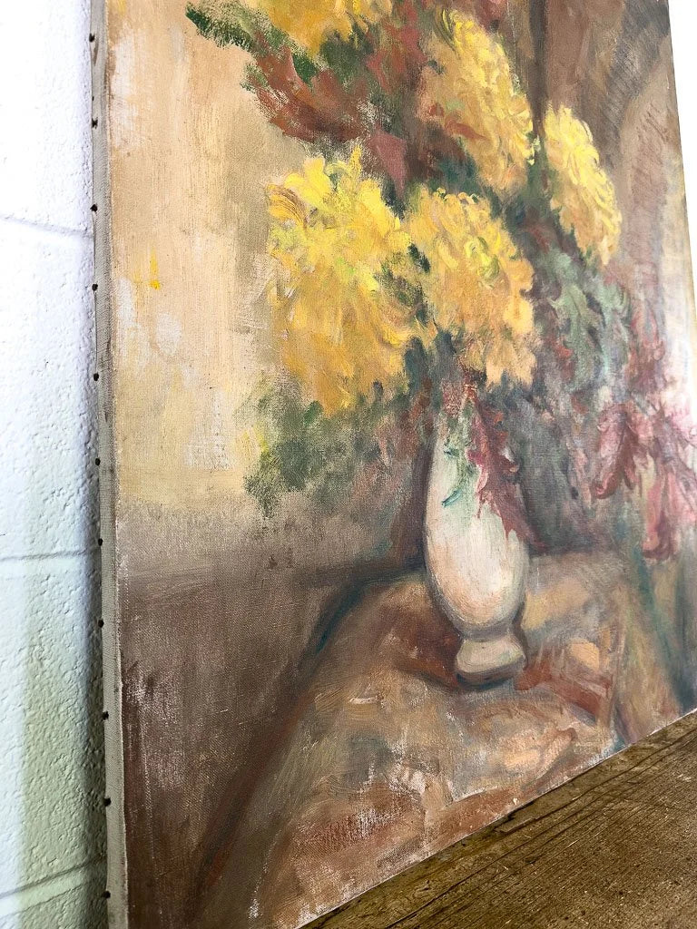 Large antique painting of flowers in a vase