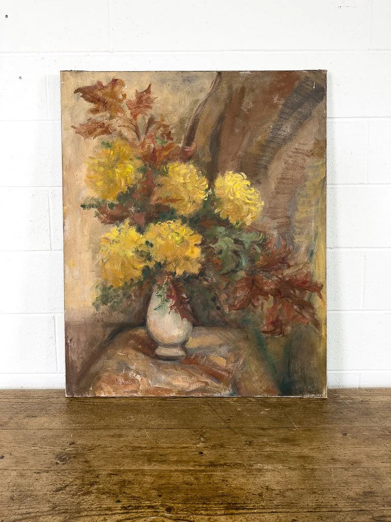 Large antique painting of flowers in a vase
