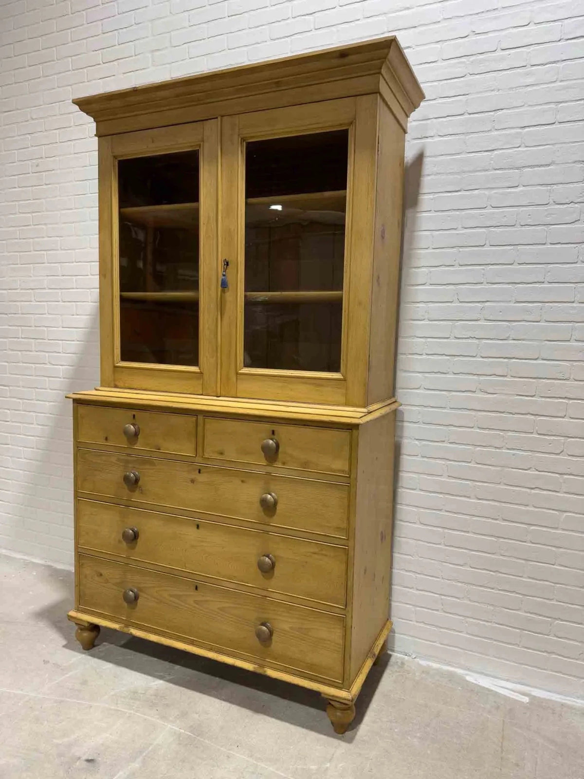 Antique English cupboard with glass doors - House on Horizon