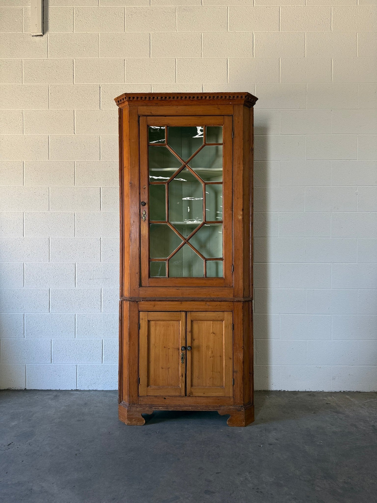 Antique English pine corner cabinet with glazed astragal door - House on Horizon