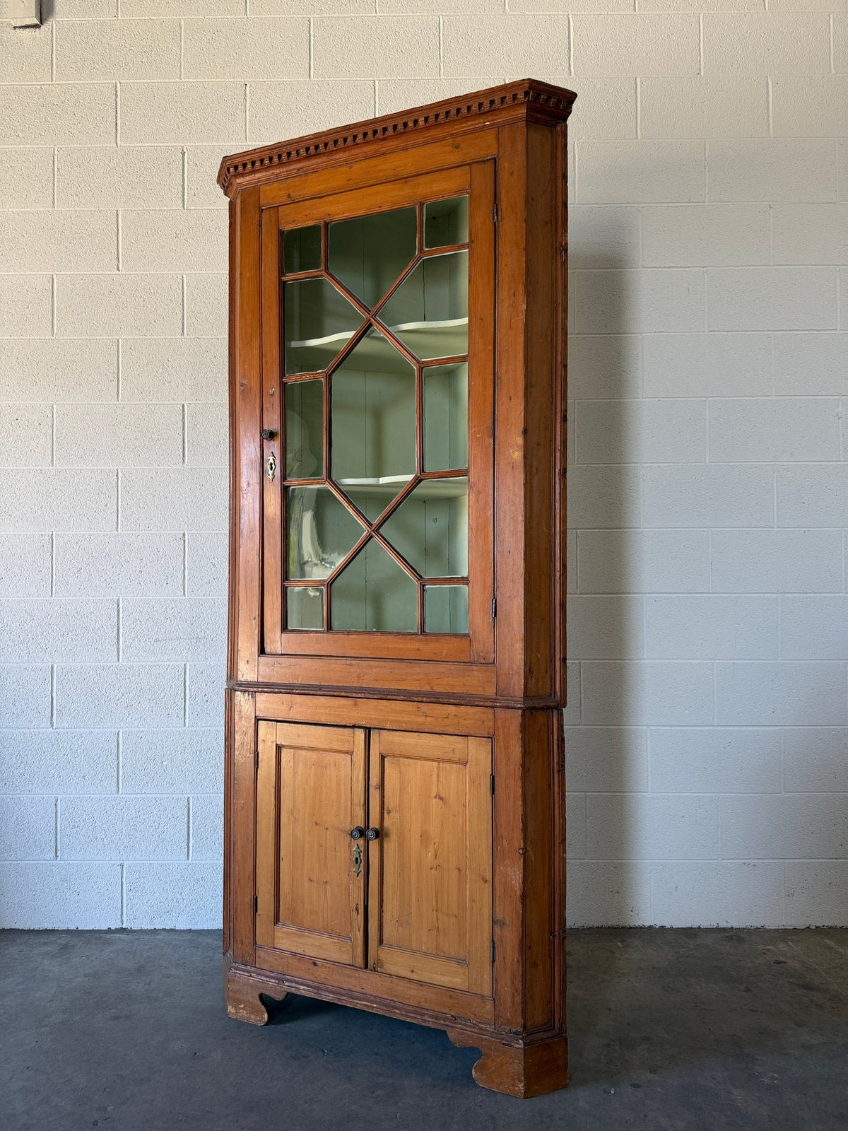 Antique English pine corner cabinet with glazed astragal door - House on Horizon