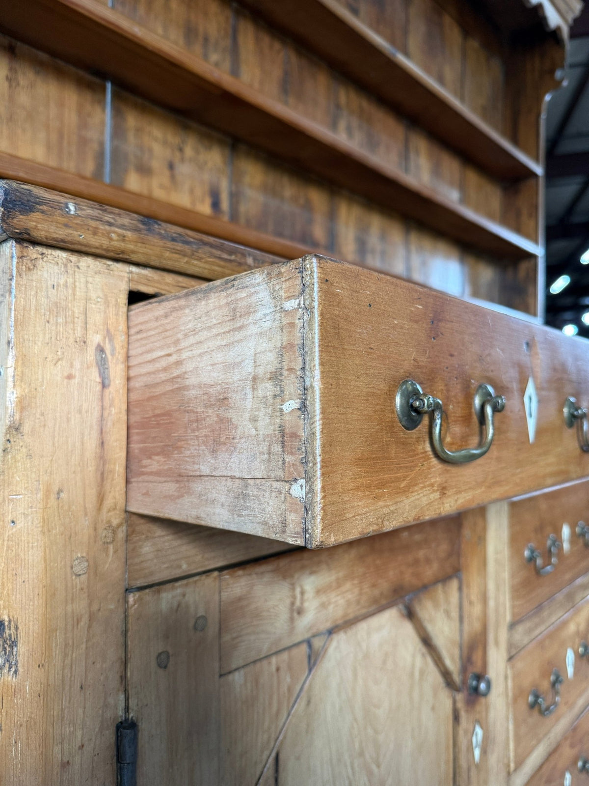 Antique English pine kitchen dresser with paneled doors and detailed trim work - House on Horizon