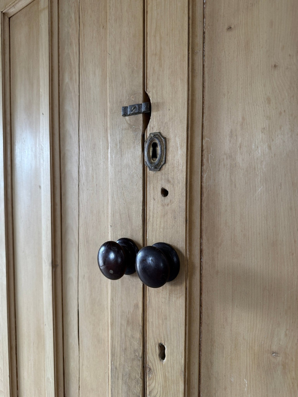 Antique English pine linen press with paneled doors - House on Horizon