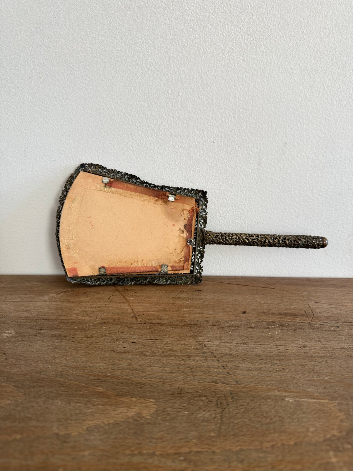 Antique hand mirror in a metal frame - House on Horizon