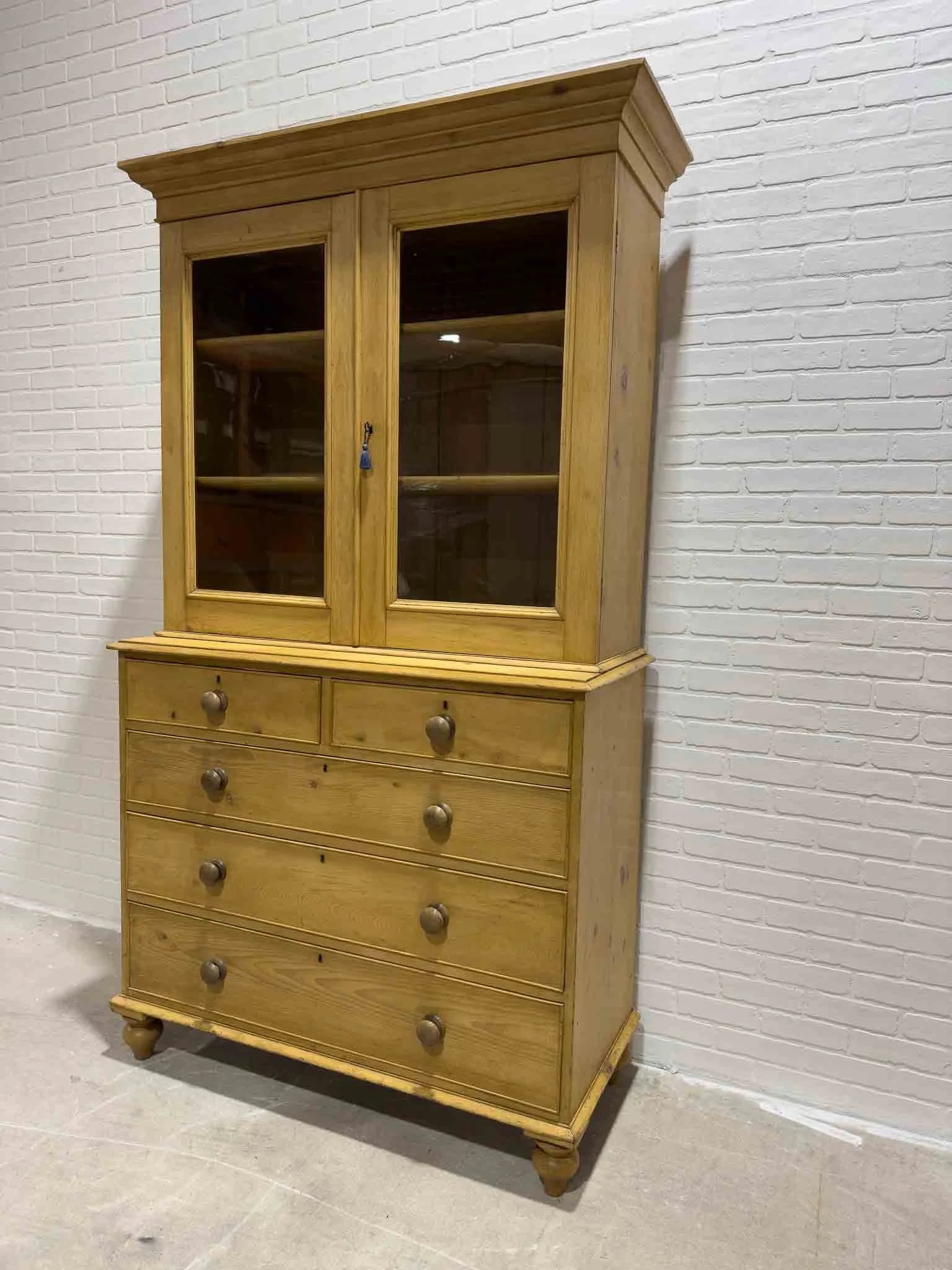 Antique English cupboard with glass doors
