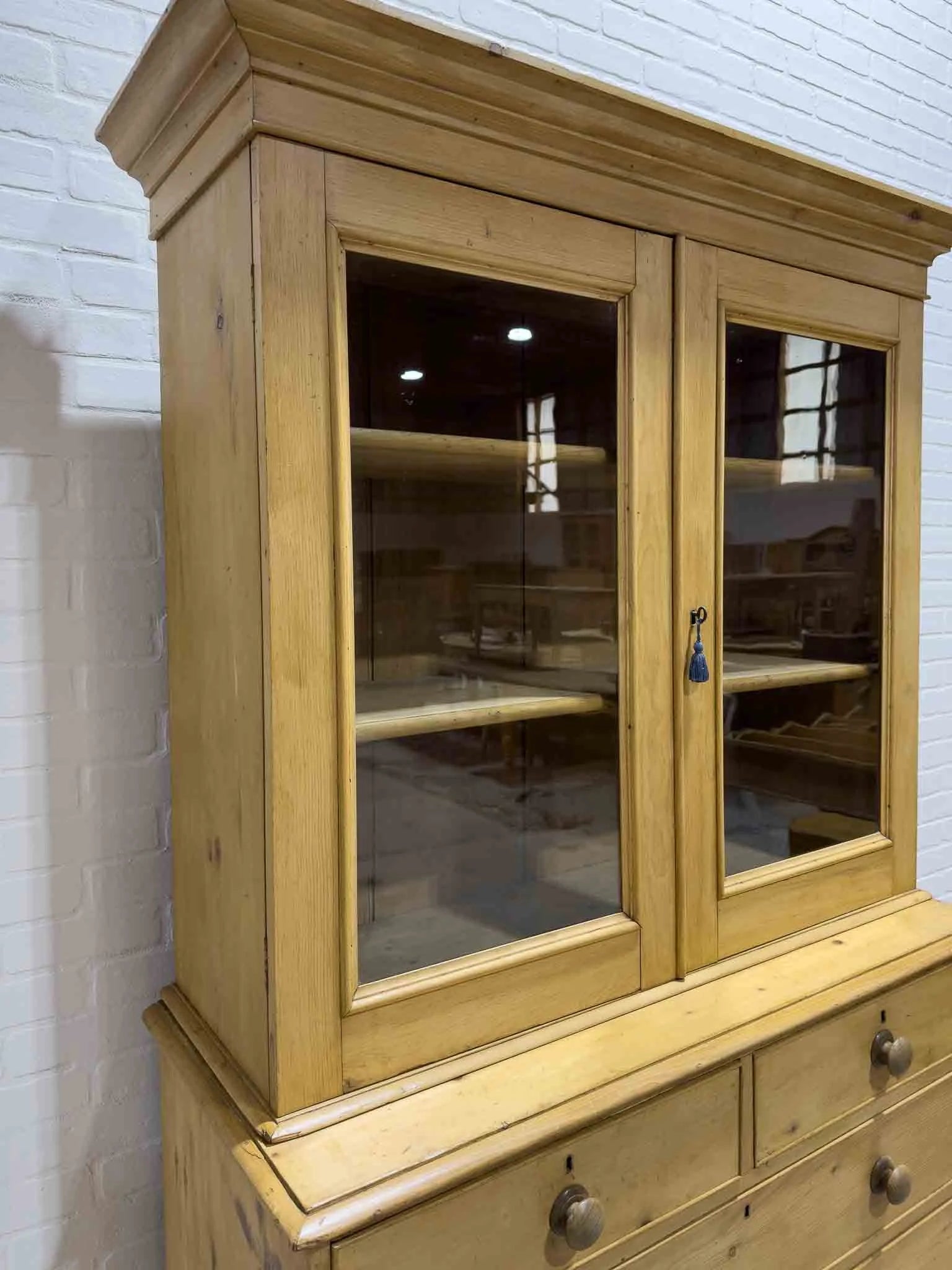 Antique English cupboard with glass doors