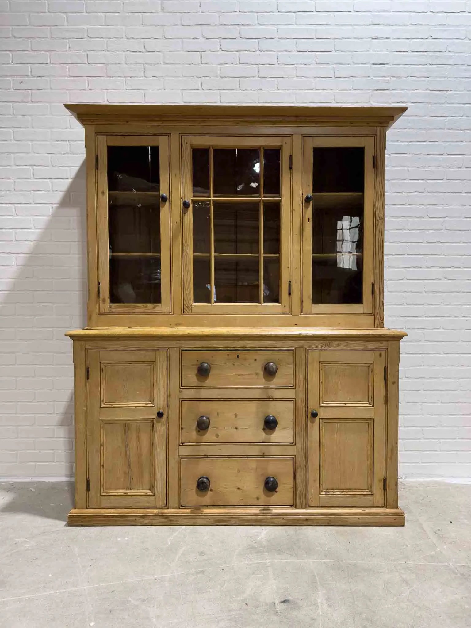 Antique English cupboard with glass doors