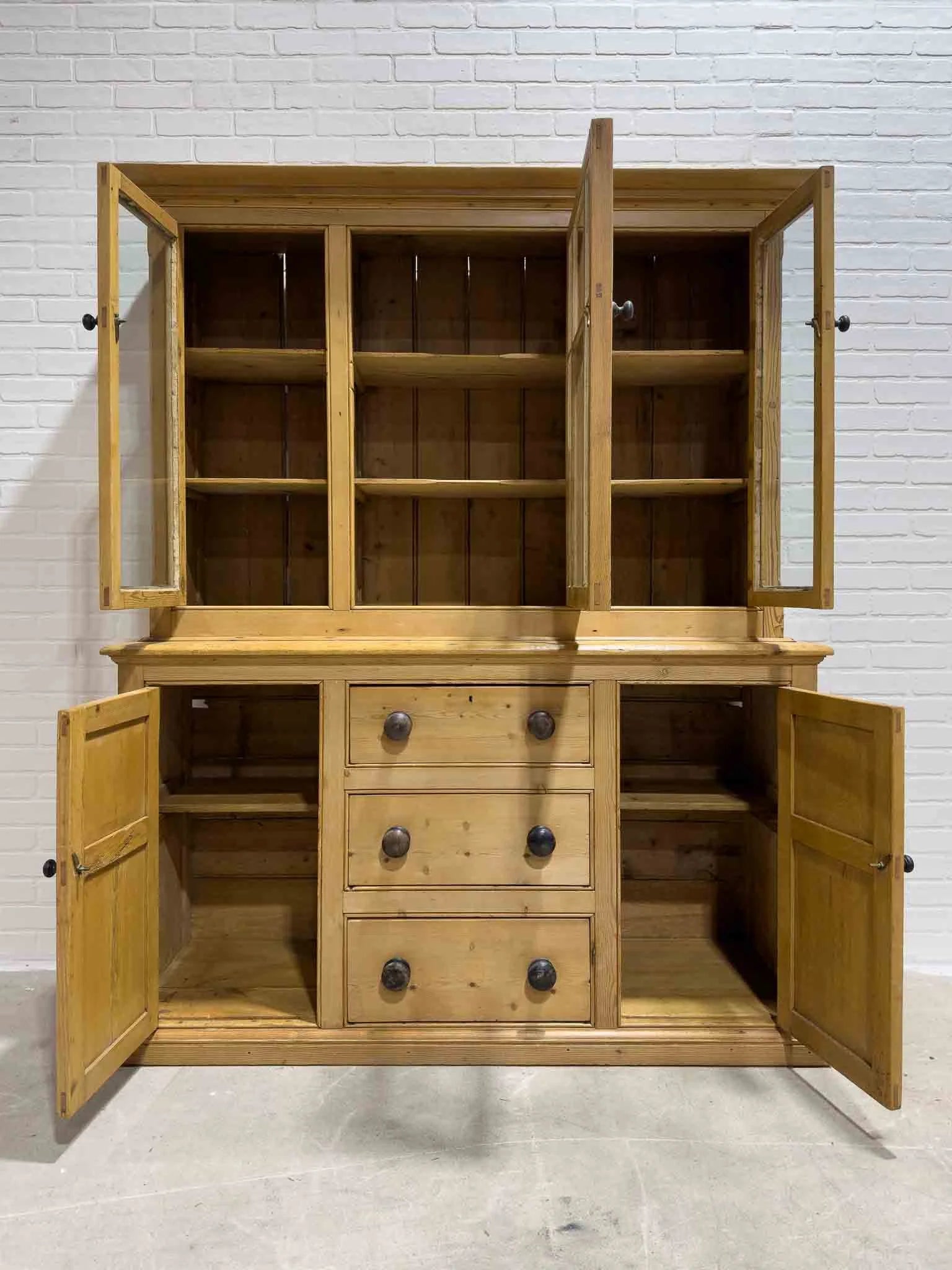Antique English cupboard with glass doors