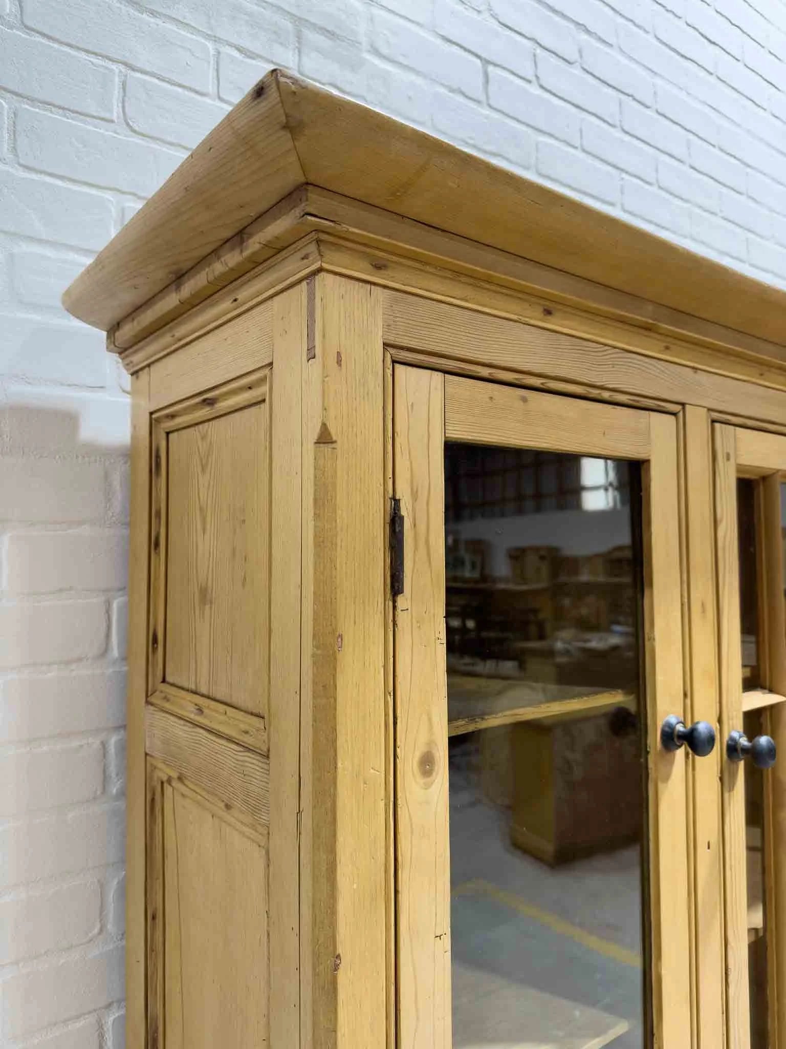 Antique English cupboard with glass doors