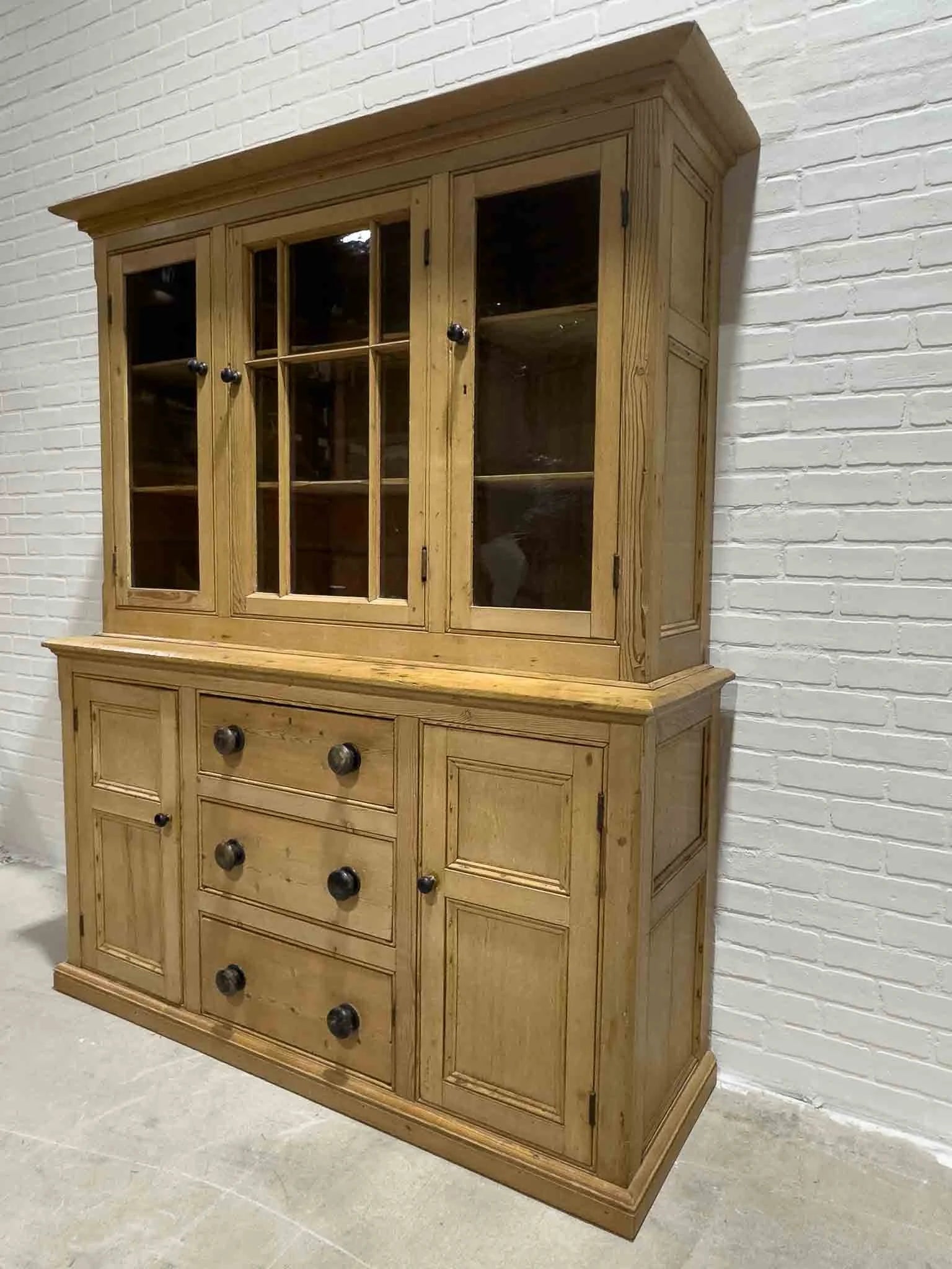 Antique English cupboard with glass doors