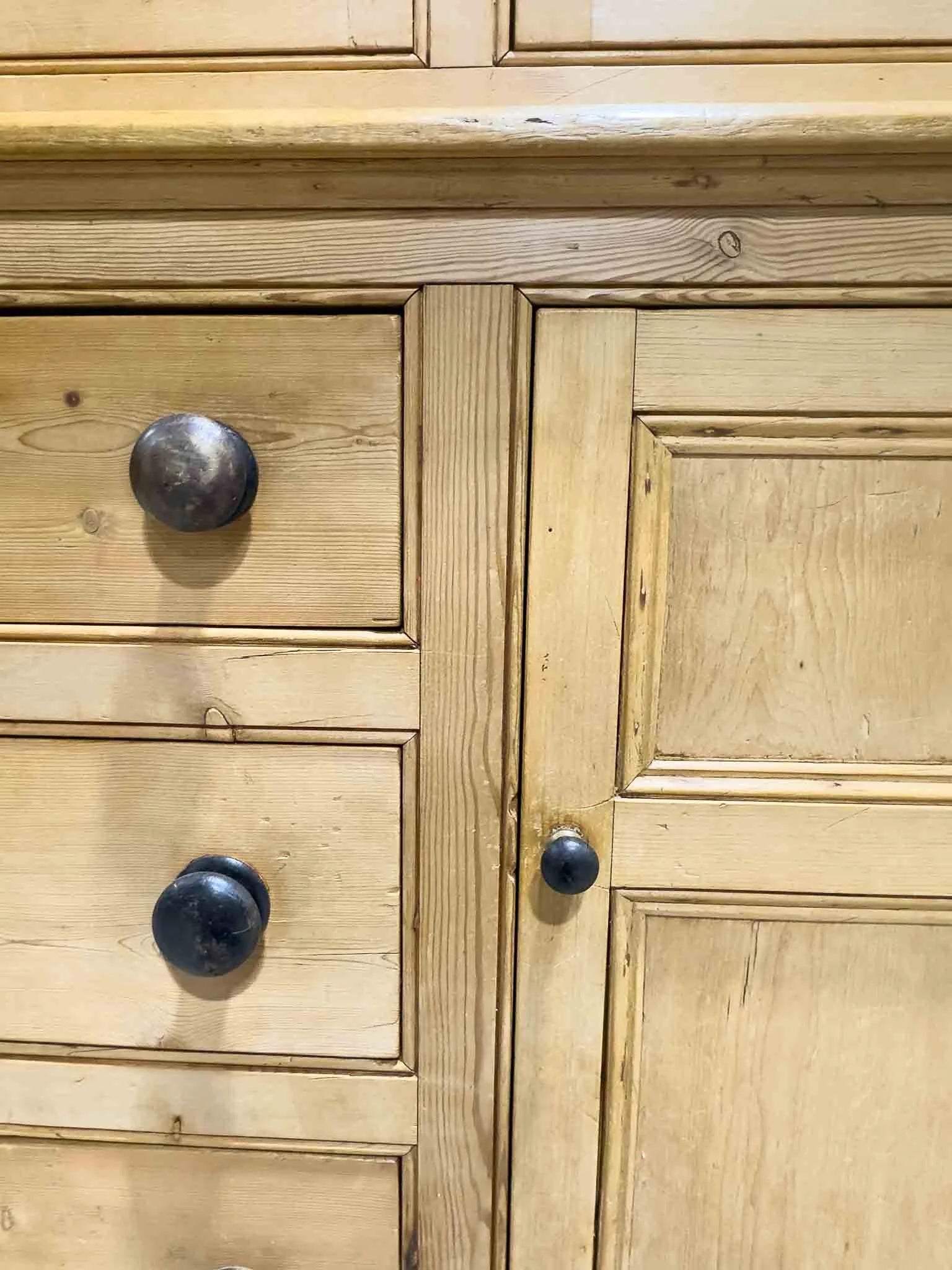 Antique English cupboard with glass doors