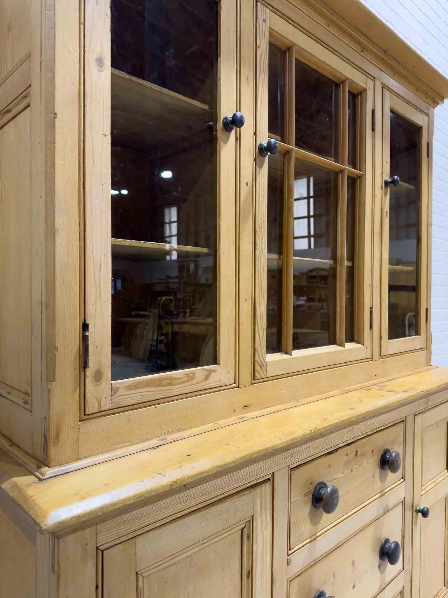 Antique English cupboard with glass doors
