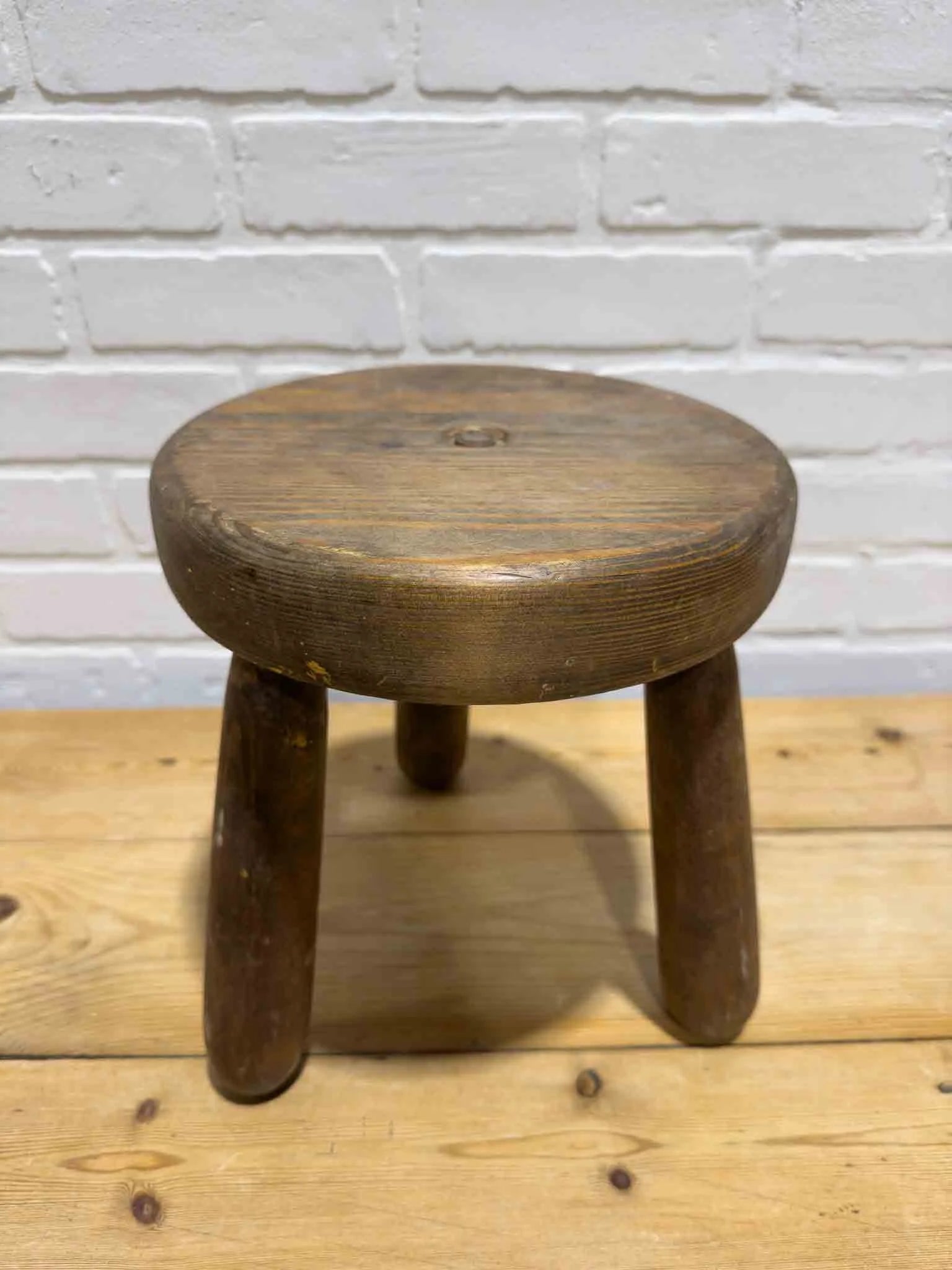 Antique milking stool