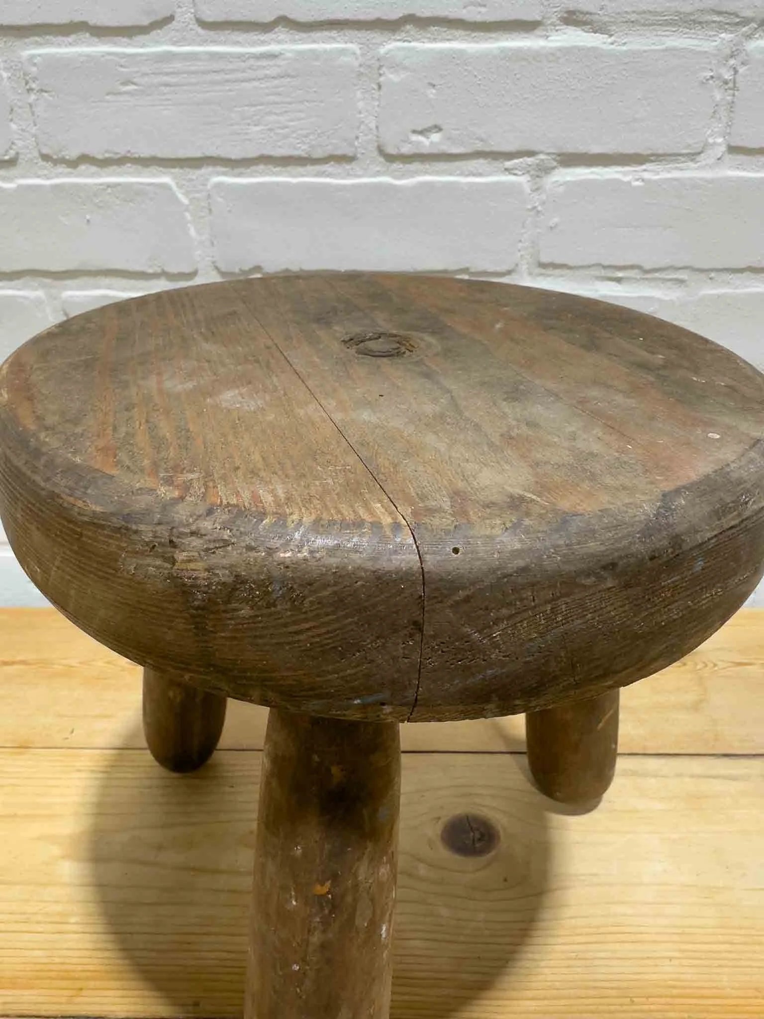 Antique milking stool