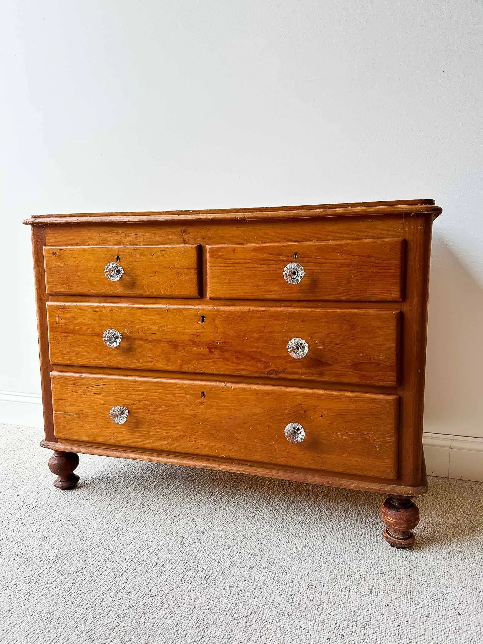 Small English pine set of drawers with glass knobs