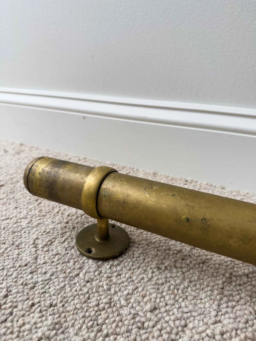Three vintage brass foot rails