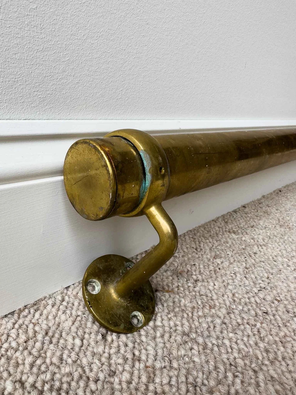 Long antique brass foot rail