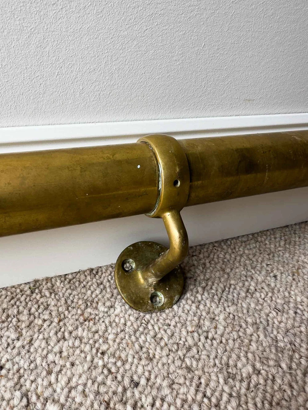 Long antique brass foot rail