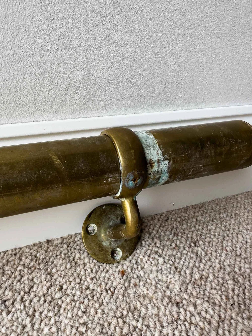Long antique brass foot rail