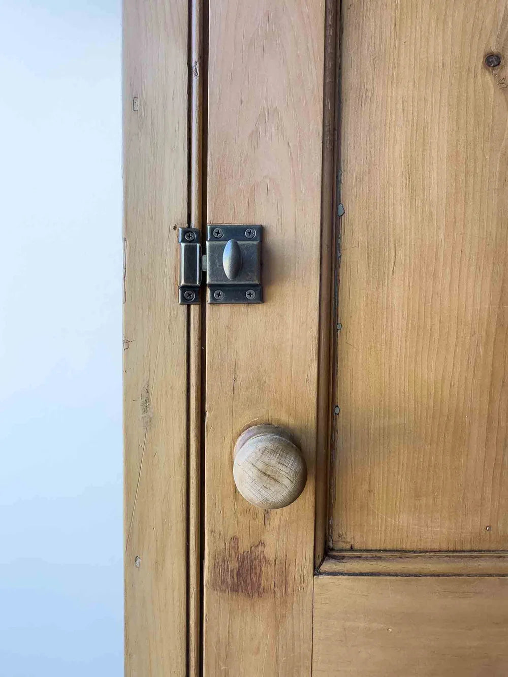 Tall English antique pine cupboard