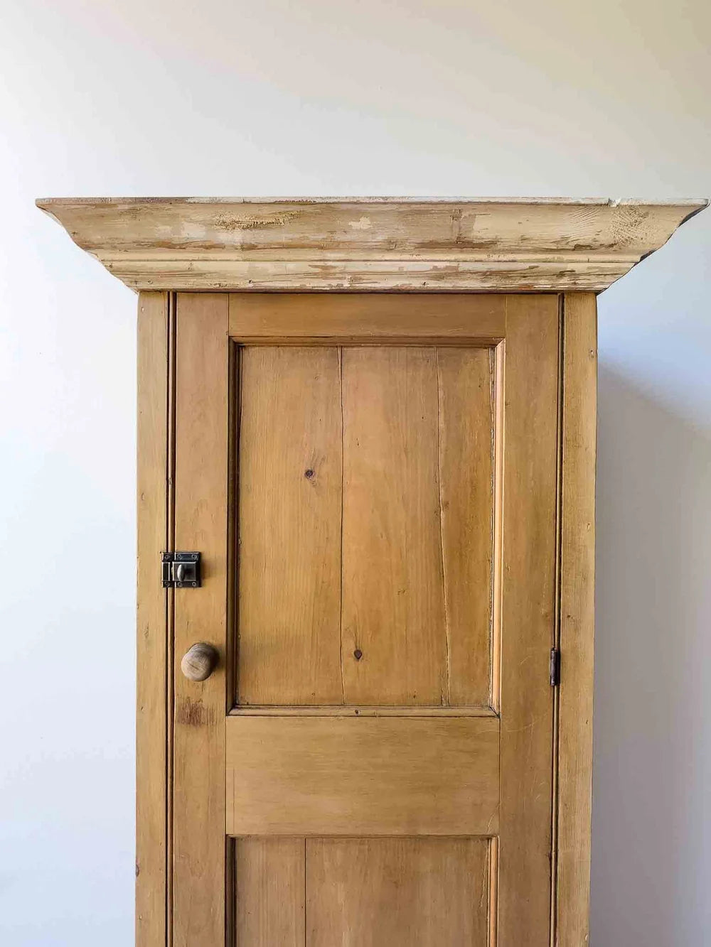 Tall English antique pine cupboard