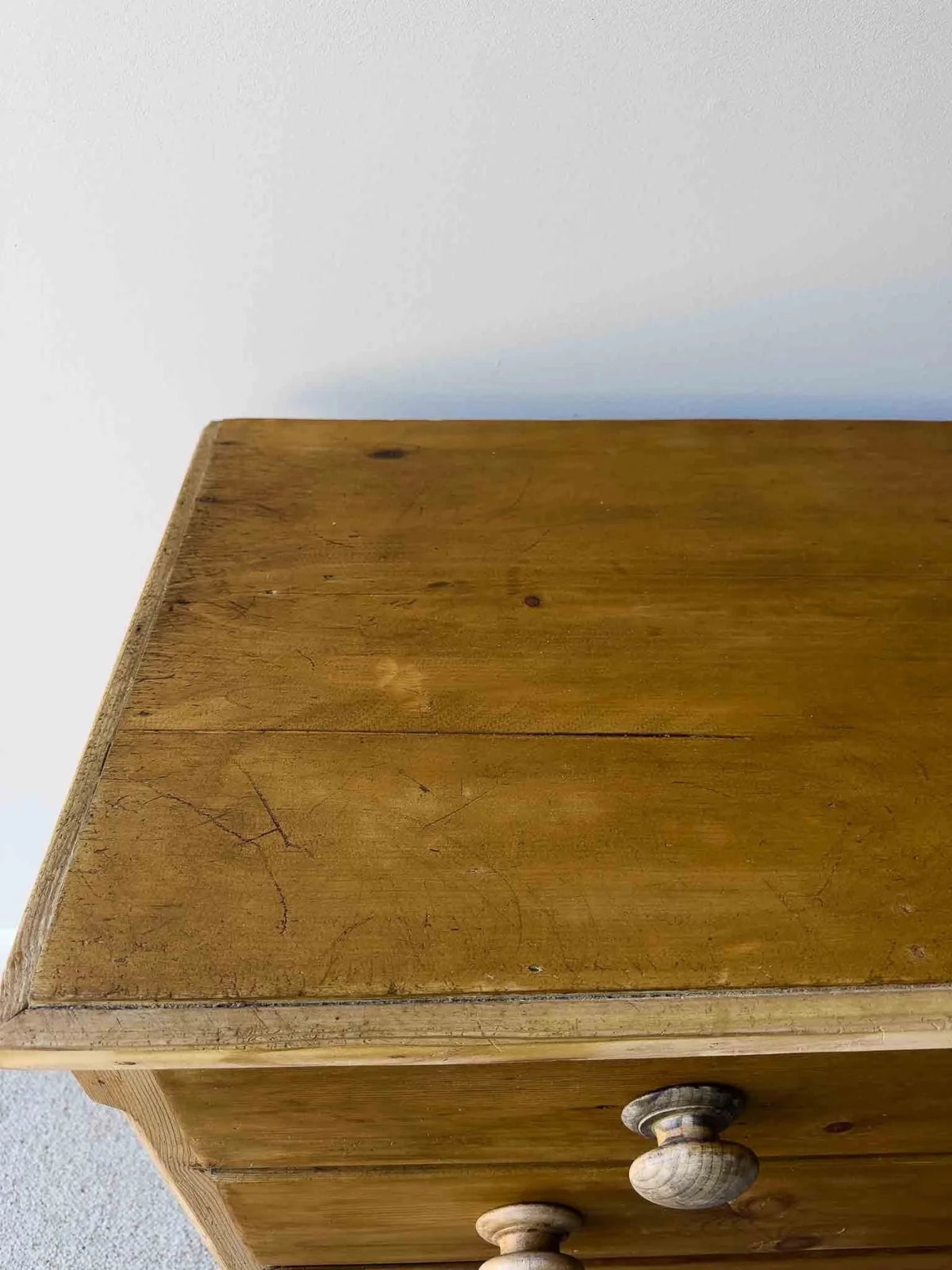 Mid-brown colored set of victorian pine drawers - House on Horizon