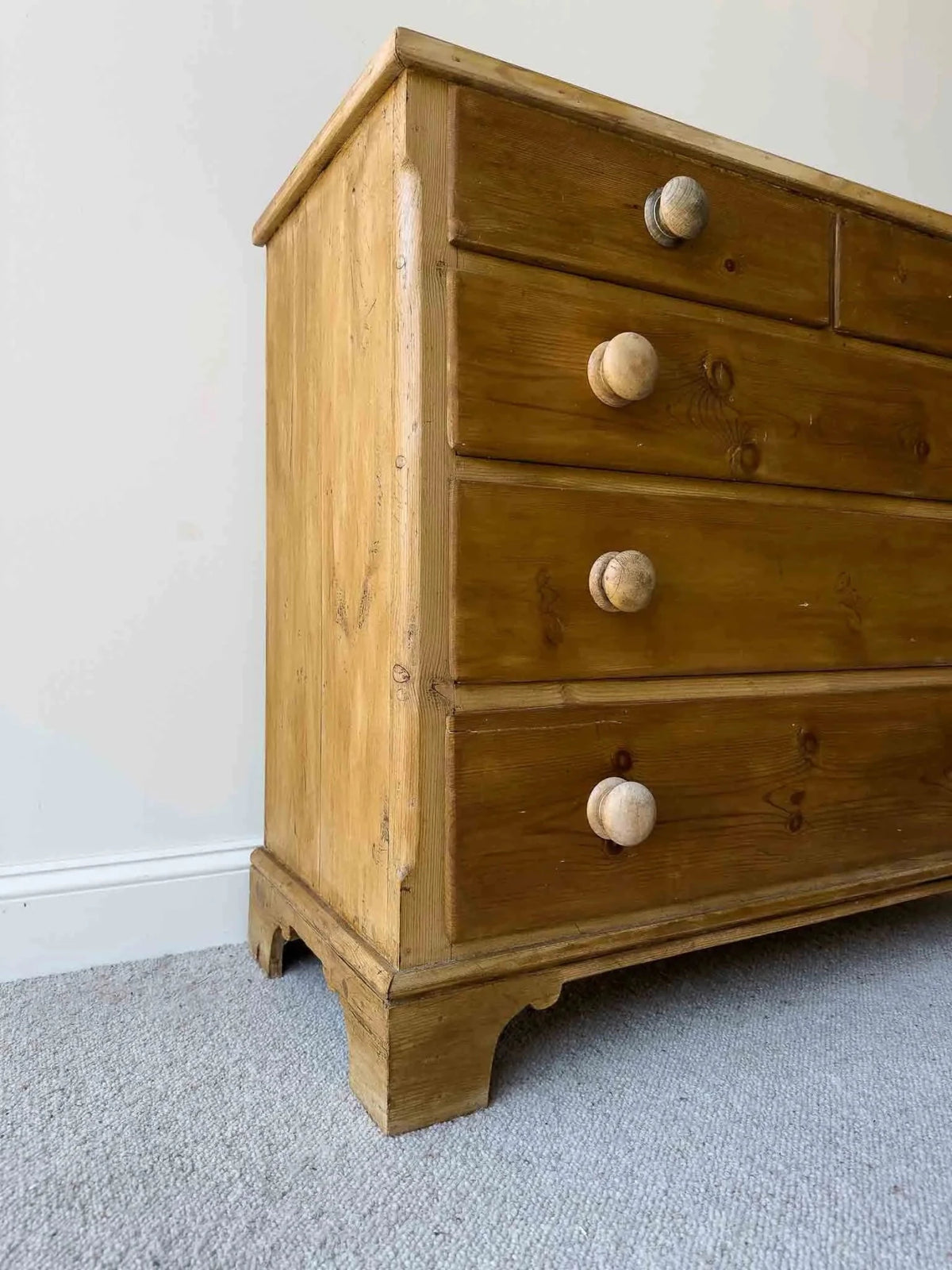 Mid-brown colored set of victorian pine drawers - House on Horizon