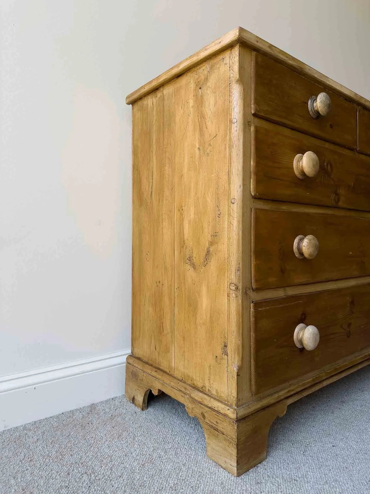 Mid-brown colored set of victorian pine drawers - House on Horizon