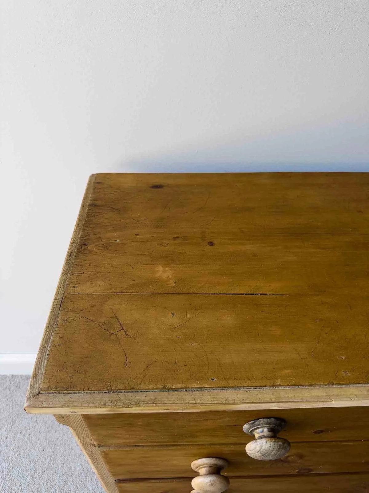 Mid-brown colored set of victorian pine drawers - House on Horizon