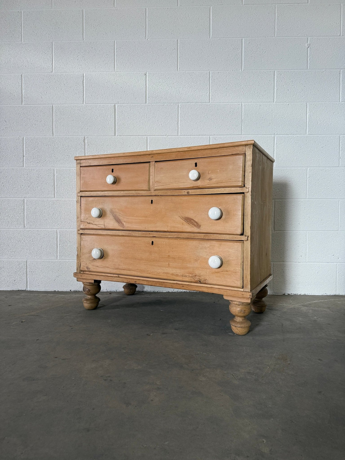 Petite pine chest of drawers with original porcelain knobs - House on Horizon