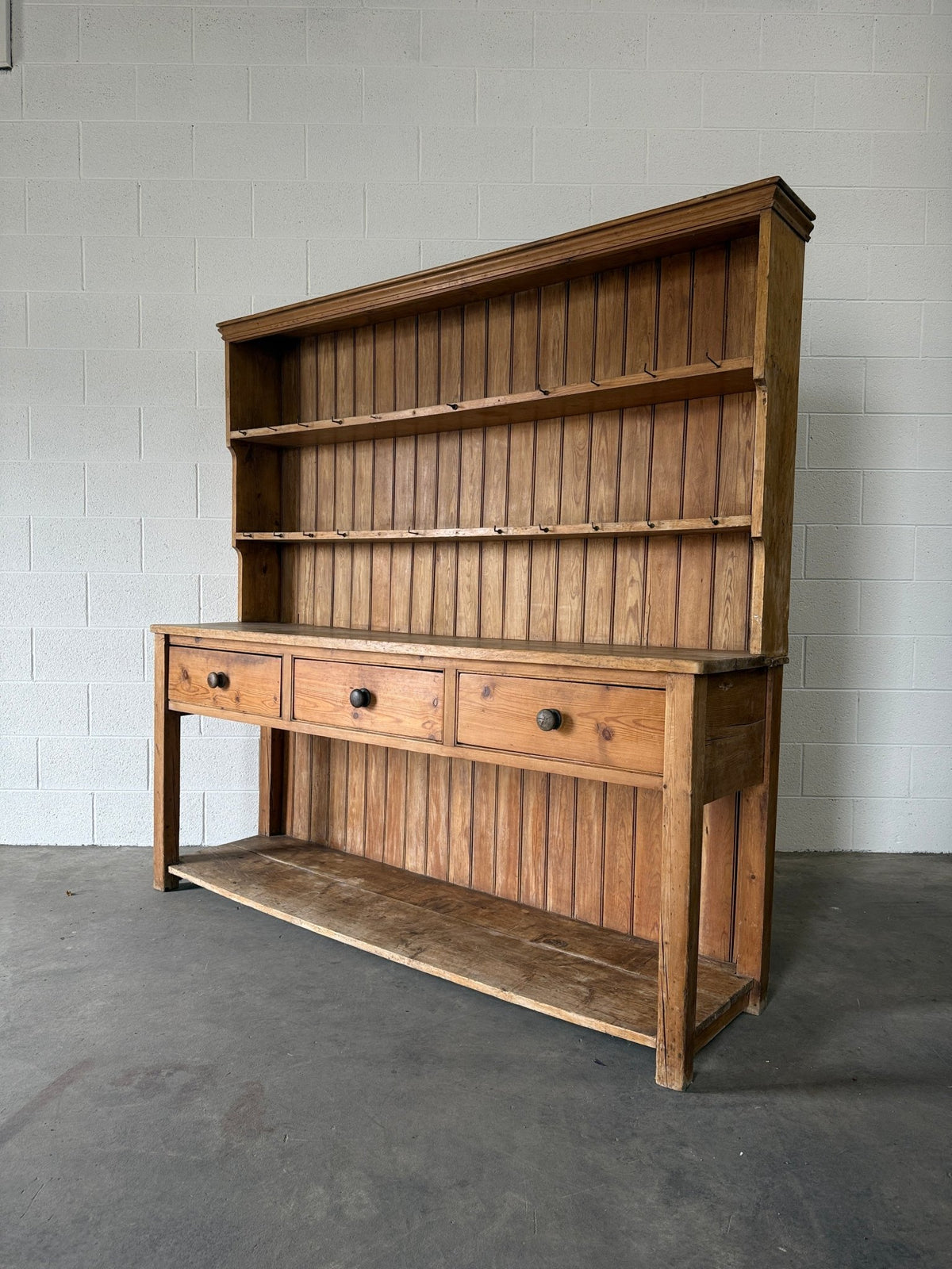 Simple antique English pine kitchen dresser with potboard base - House on Horizon